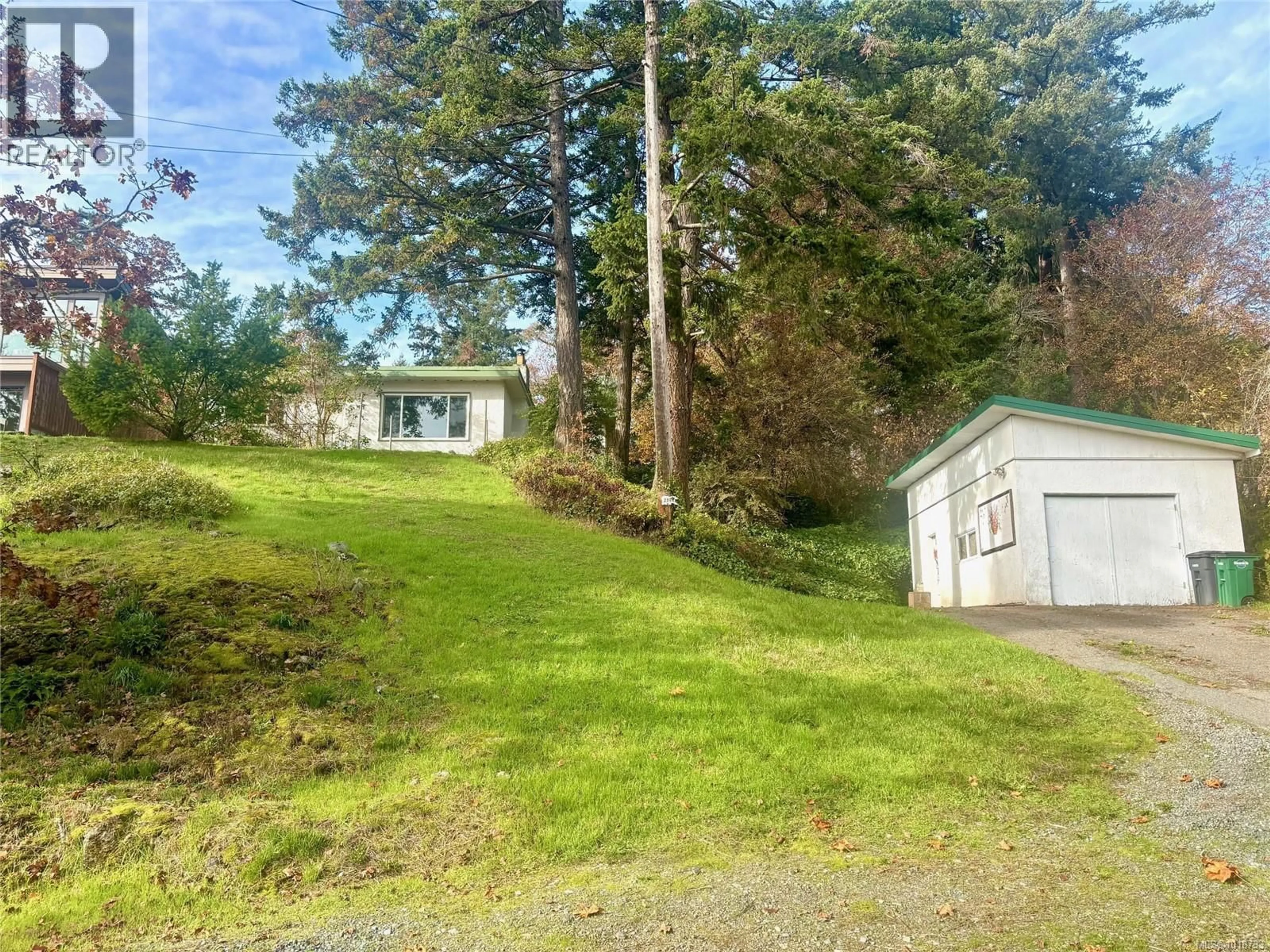 A pic from outside/outdoor area/front of a property/back of a property/a pic from drone, street for 3904 WILKINSON ROAD, Saanich British Columbia V8Z5A2