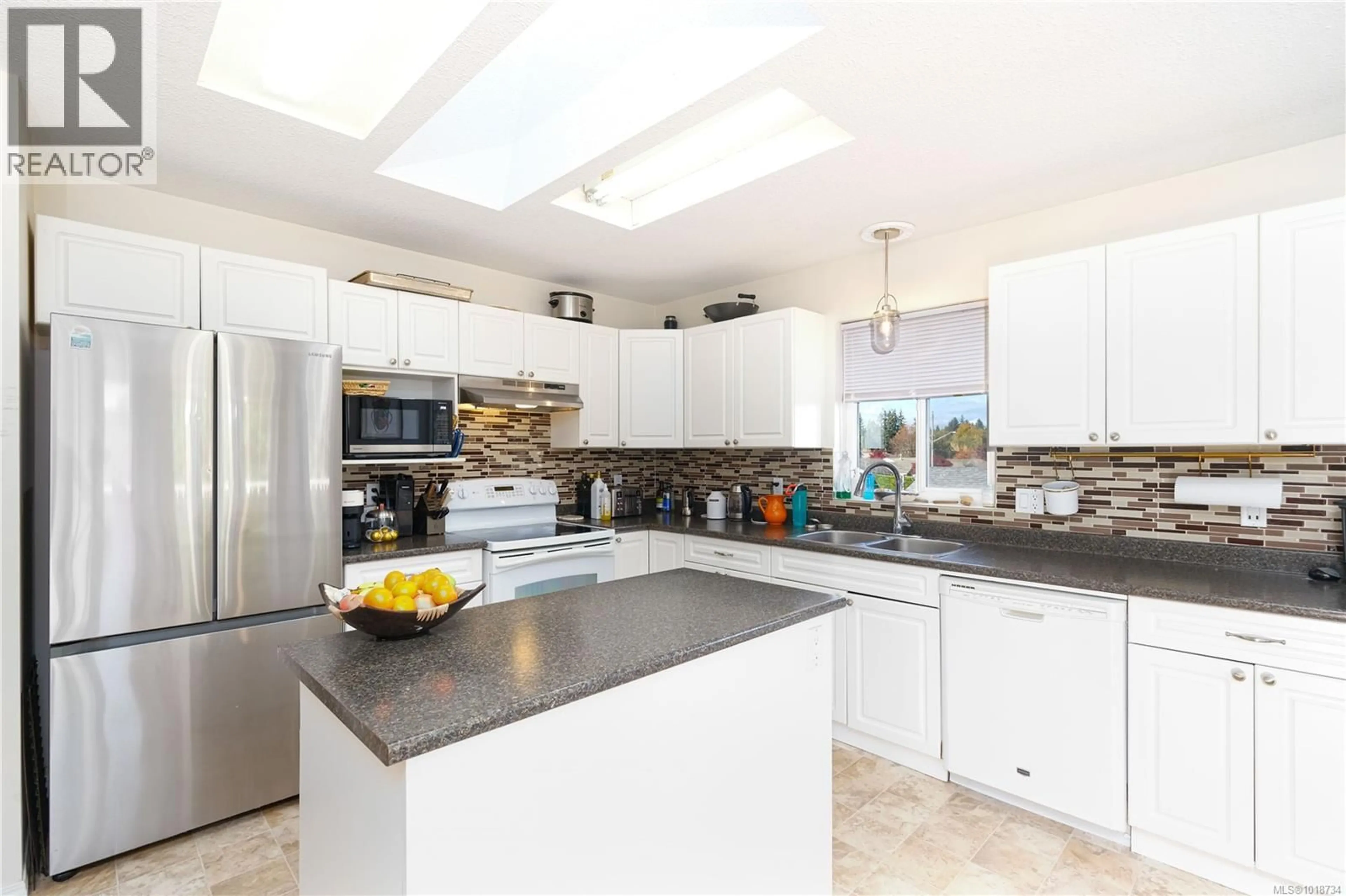 Contemporary kitchen, ceramic/tile floor for 2741 FAIRMILE ROAD, Campbell River British Columbia V9W7L6