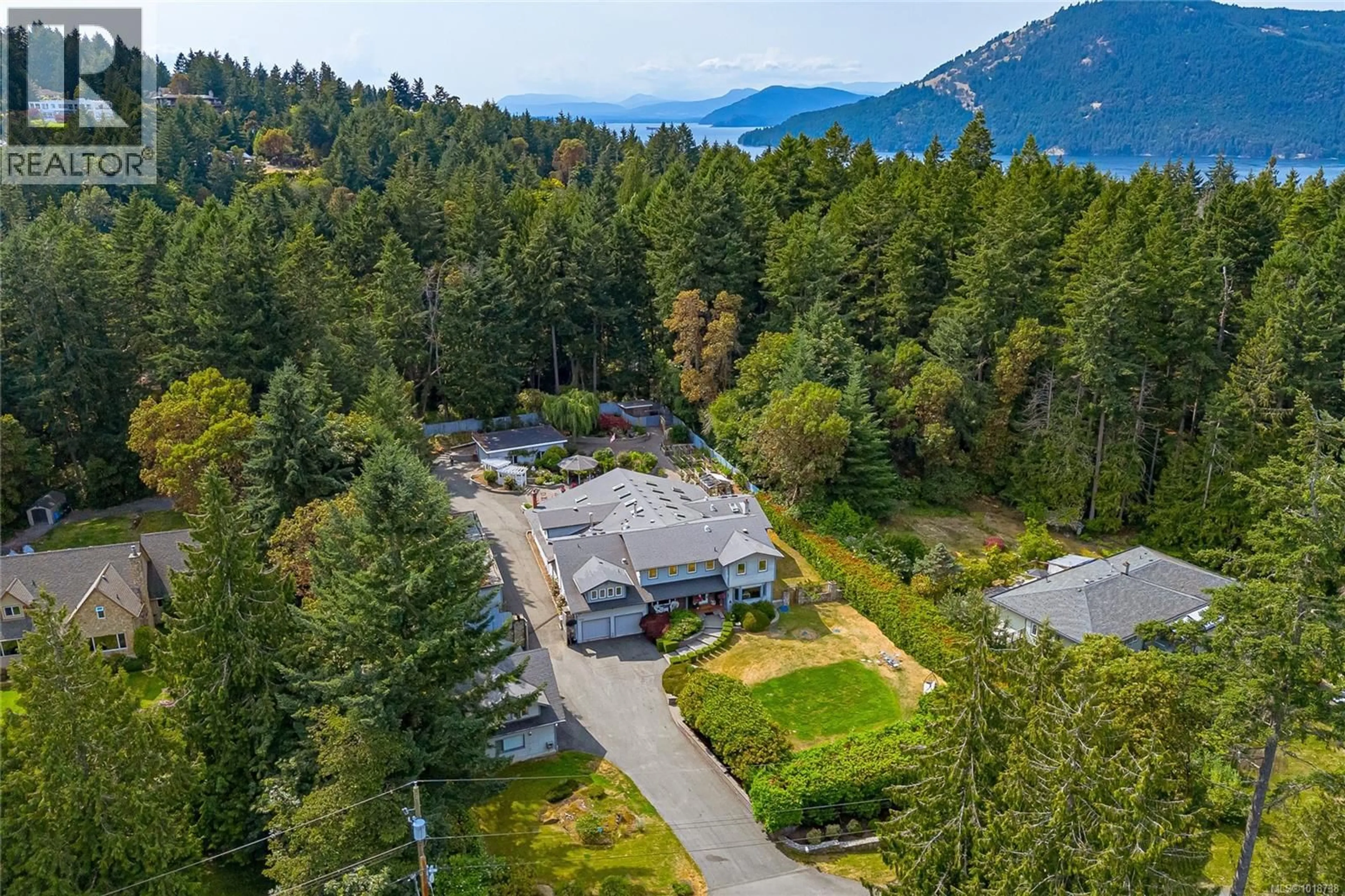 A pic from outside/outdoor area/front of a property/back of a property/a pic from drone, mountain view for 11376 OSPREY PLACE, North Saanich British Columbia V8L5K6
