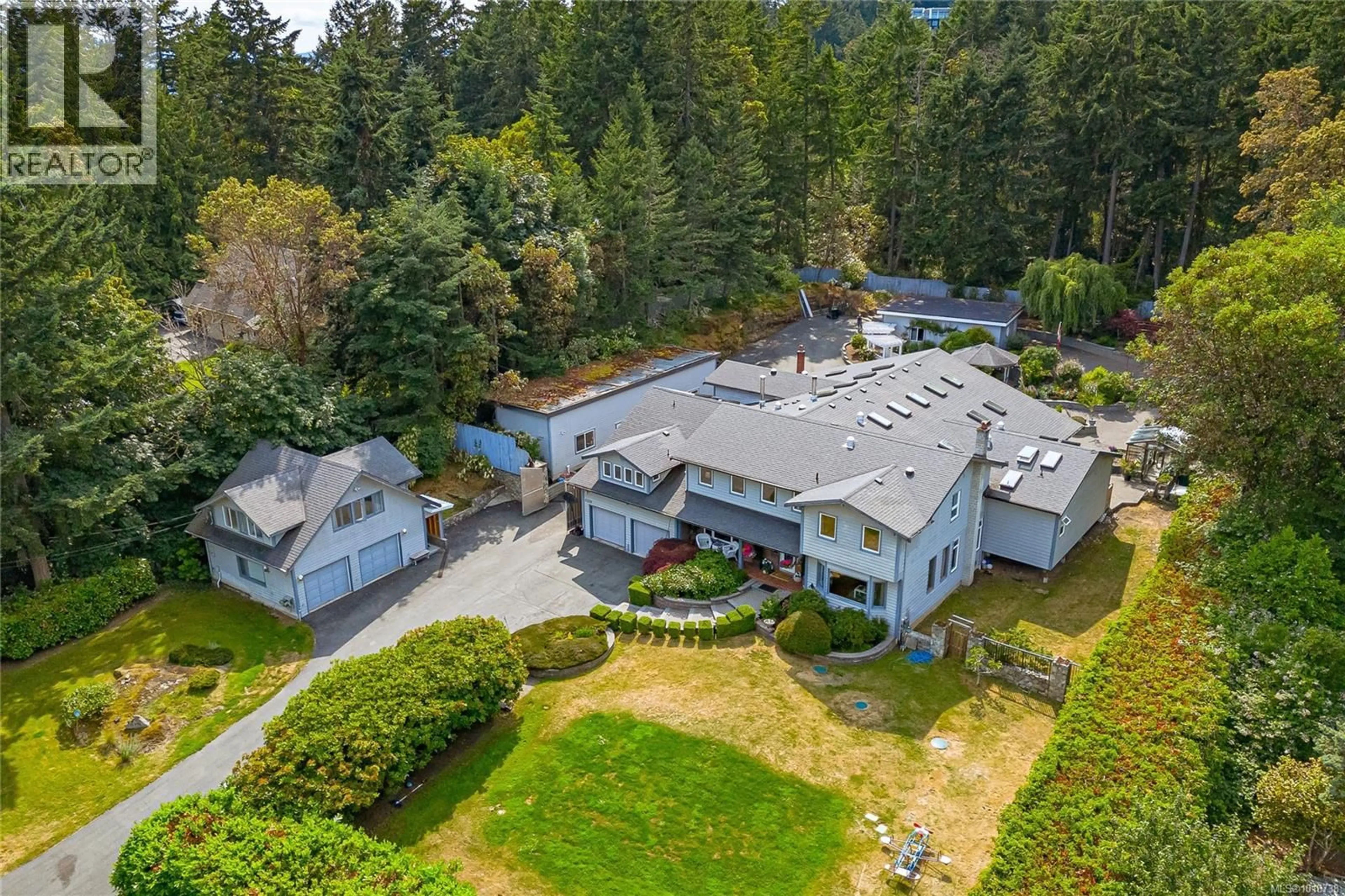 A pic from outside/outdoor area/front of a property/back of a property/a pic from drone, mountain view for 11376 OSPREY PLACE, North Saanich British Columbia V8L5K6