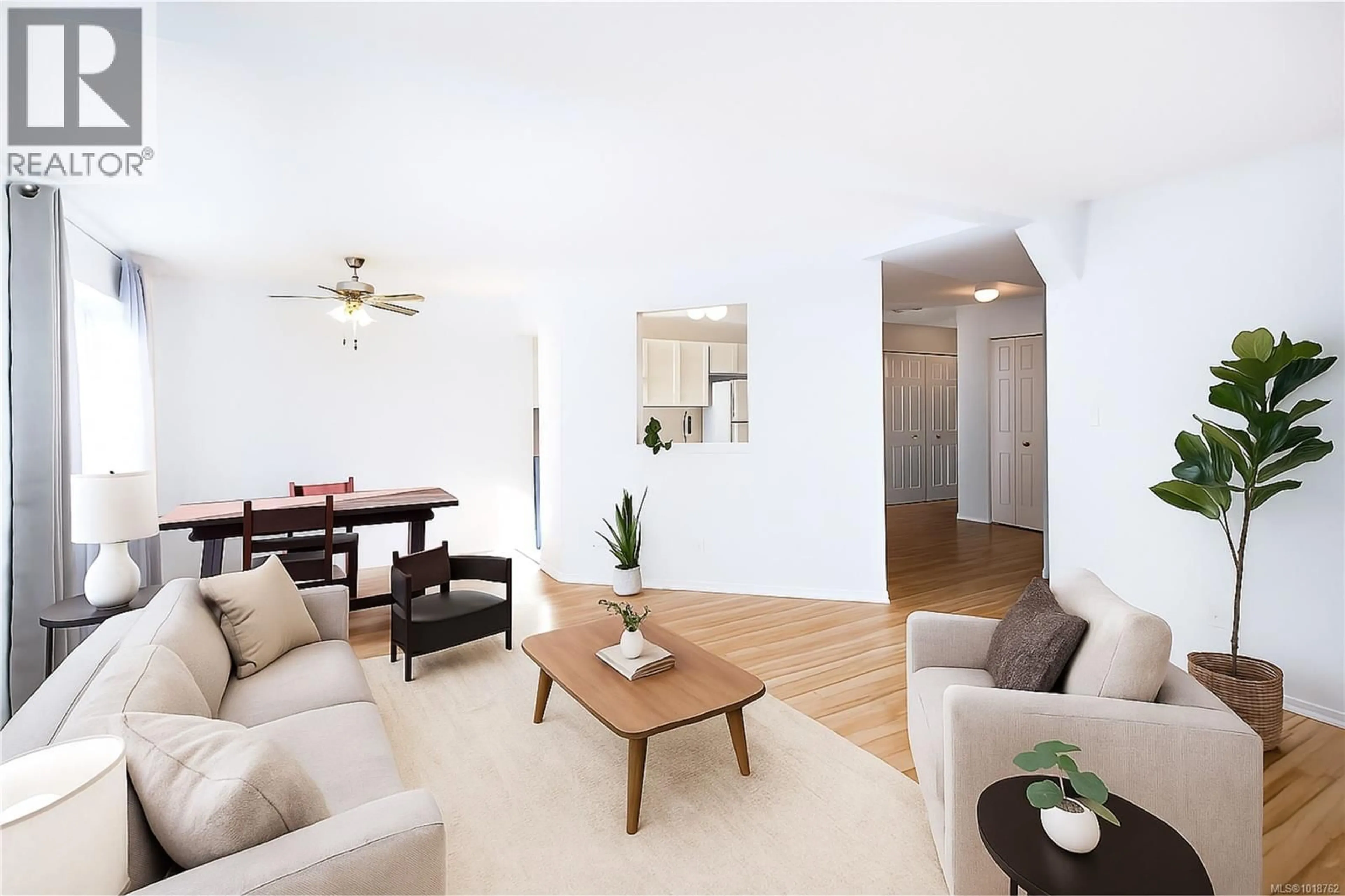 Living room with furniture, wood/laminate floor for 201 - 3226 COWICHAN LAKE ROAD, Duncan British Columbia V9L4B9