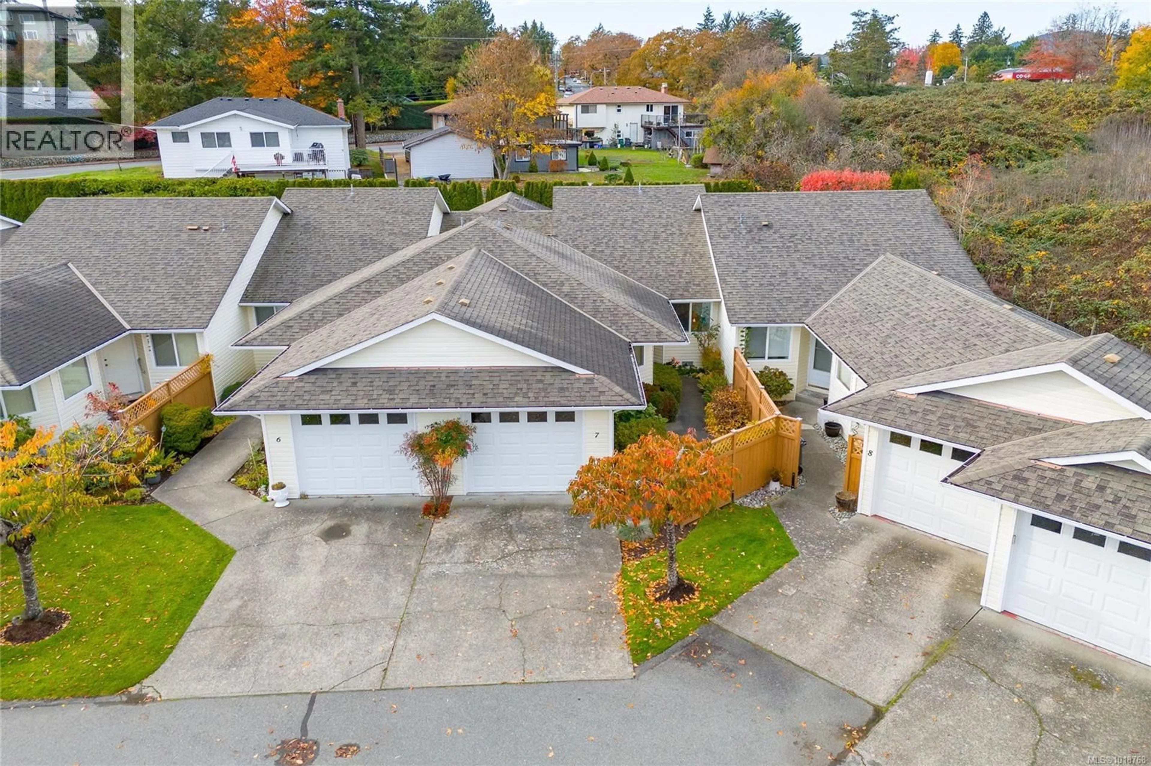 A pic from outside/outdoor area/front of a property/back of a property/a pic from drone, street for 7 - 4125 INTERURBAN ROAD, Saanich British Columbia V8Z4W8