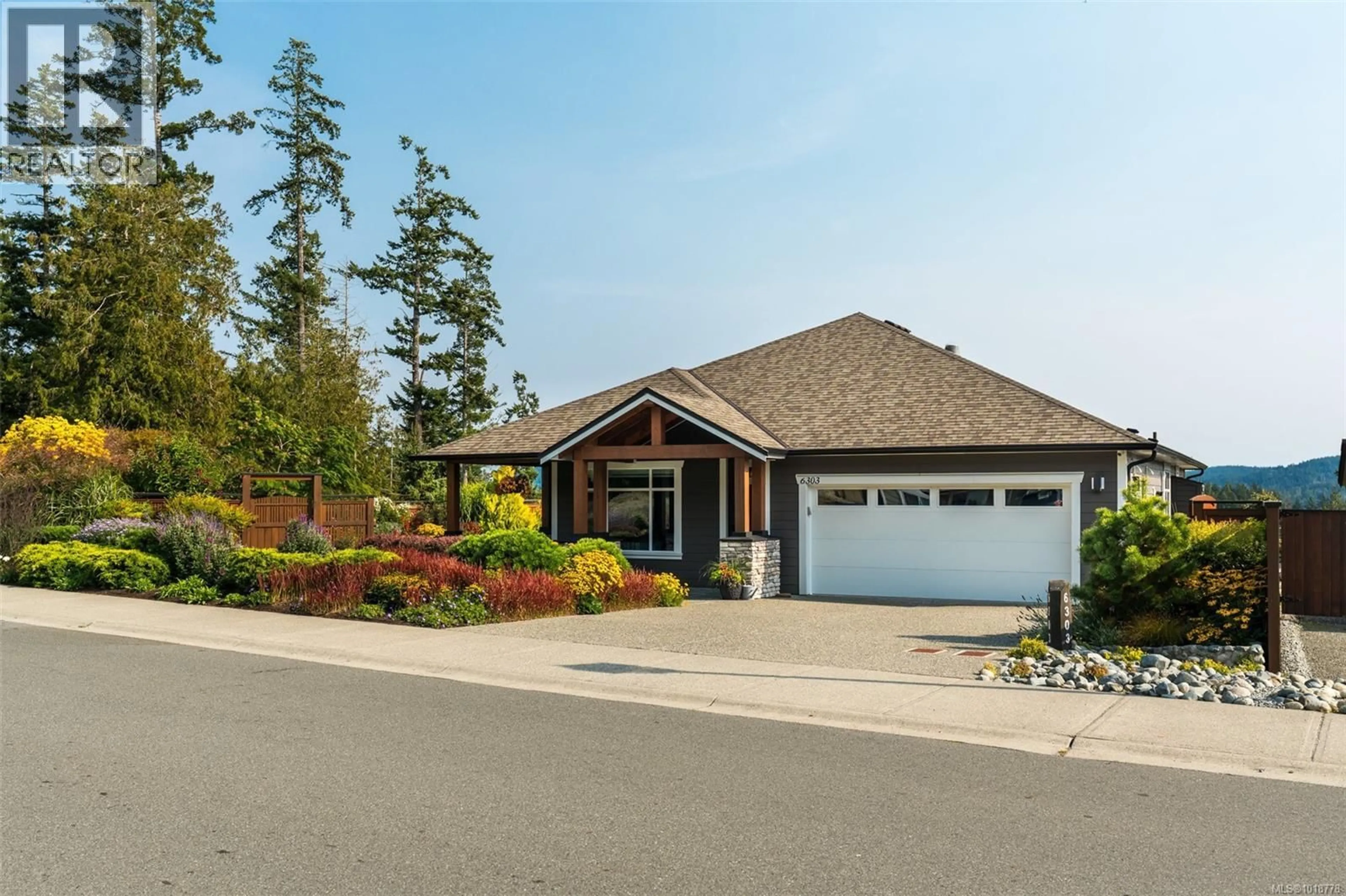 Home with vinyl exterior material, street for 6303 RIVERSTONE DRIVE, Sooke British Columbia V9Z1N4