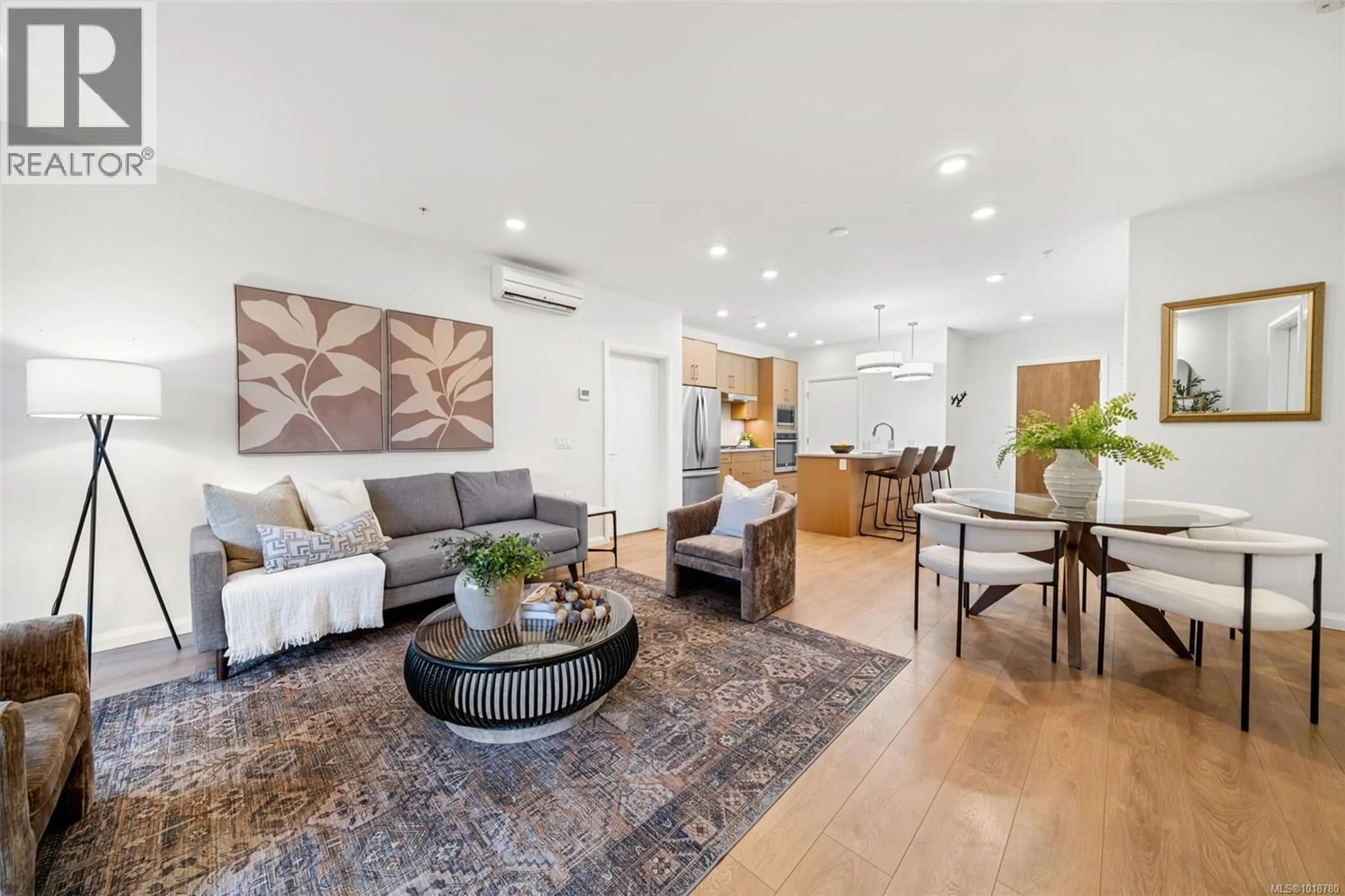 Living room with furniture, unknown for 112 - 745 TRAVINO LANE, Saanich British Columbia V8Z0E5