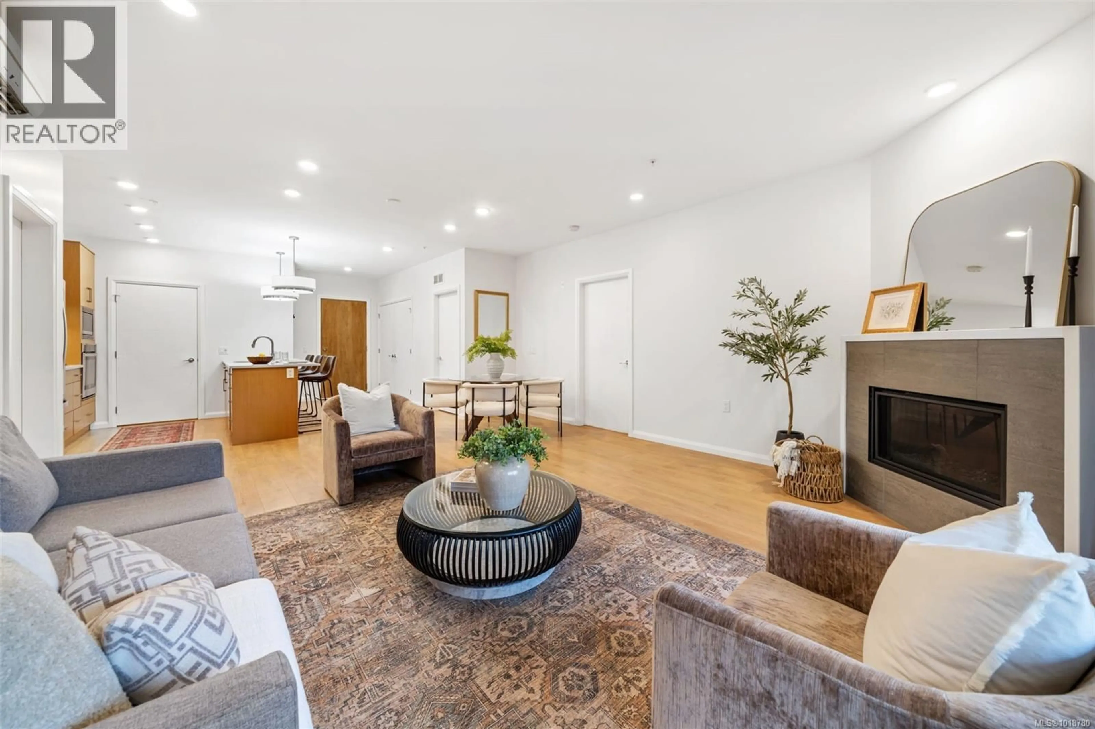 Living room with furniture, unknown for 112 - 745 TRAVINO LANE, Saanich British Columbia V8Z0E5