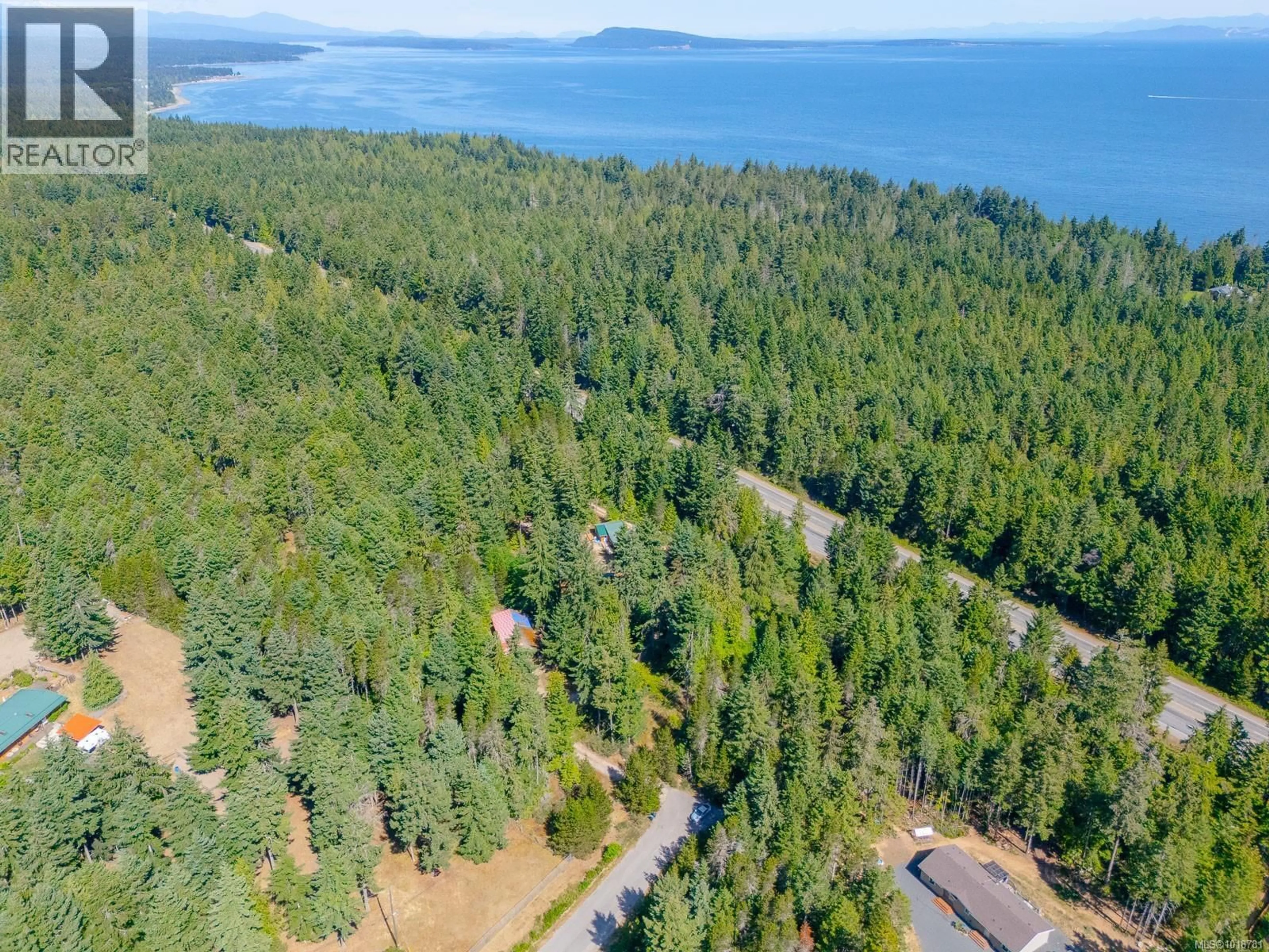 A pic from outside/outdoor area/front of a property/back of a property/a pic from drone, water/lake/river/ocean view for 300 OAKDOWNE ROAD, Qualicum Beach British Columbia V9K2G1