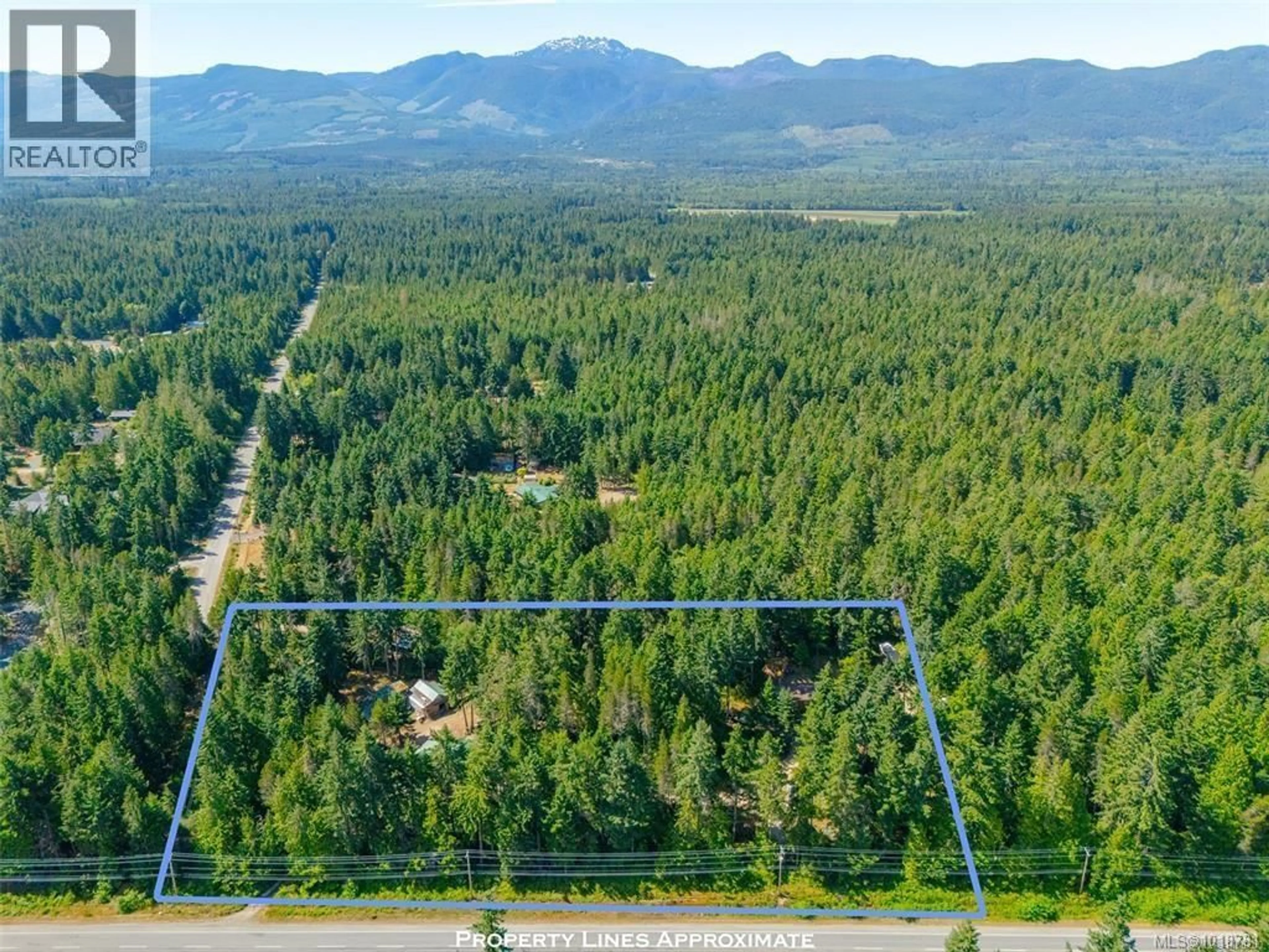 A pic from outside/outdoor area/front of a property/back of a property/a pic from drone, forest/trees view for 300 OAKDOWNE ROAD, Qualicum Beach British Columbia V9K2G1
