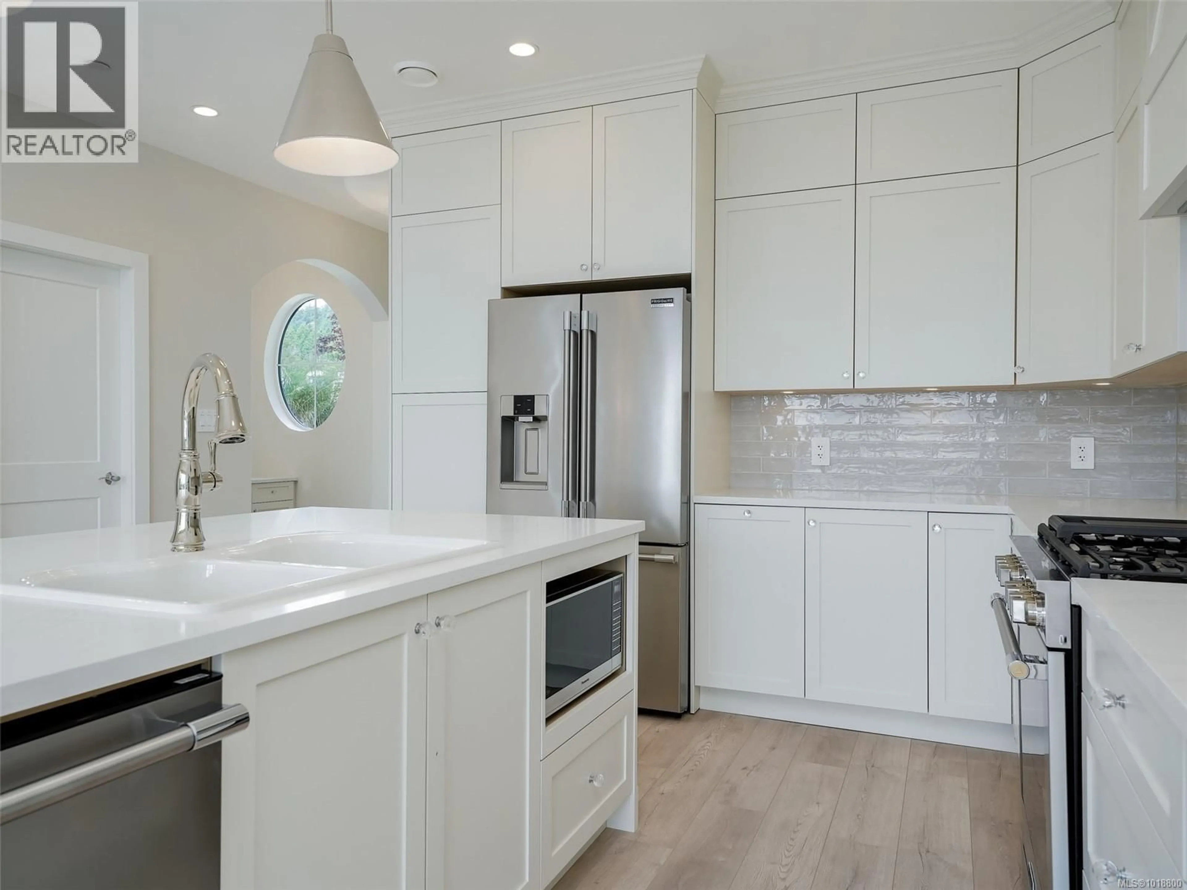 Contemporary kitchen, ceramic/tile floor for 2285 HUDSON TERRACE, Sooke British Columbia V9Z1R2