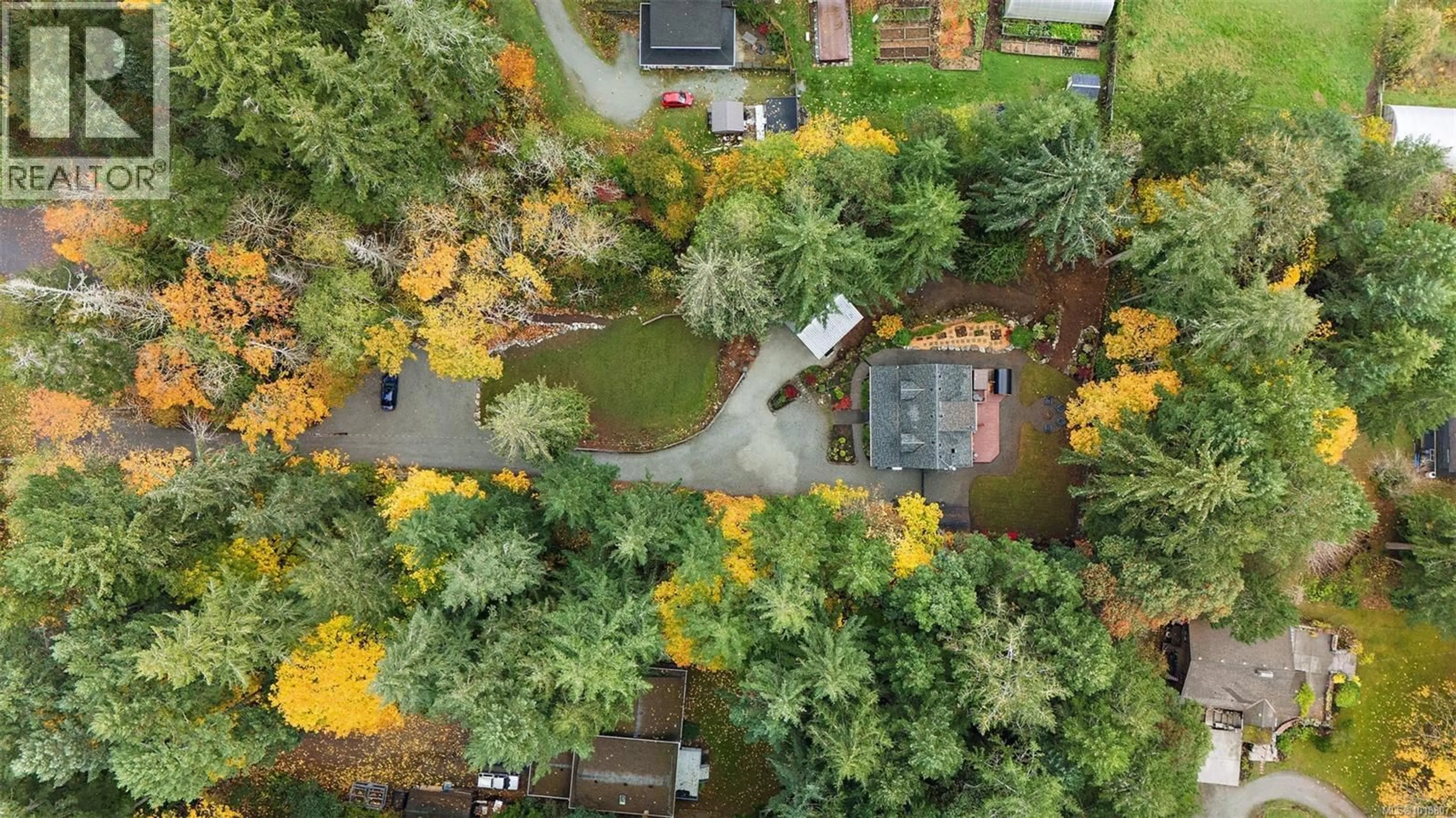 A pic from outside/outdoor area/front of a property/back of a property/a pic from drone, forest/trees view for 1409 HILLGROVE ROAD, North Saanich British Columbia V8L5K6