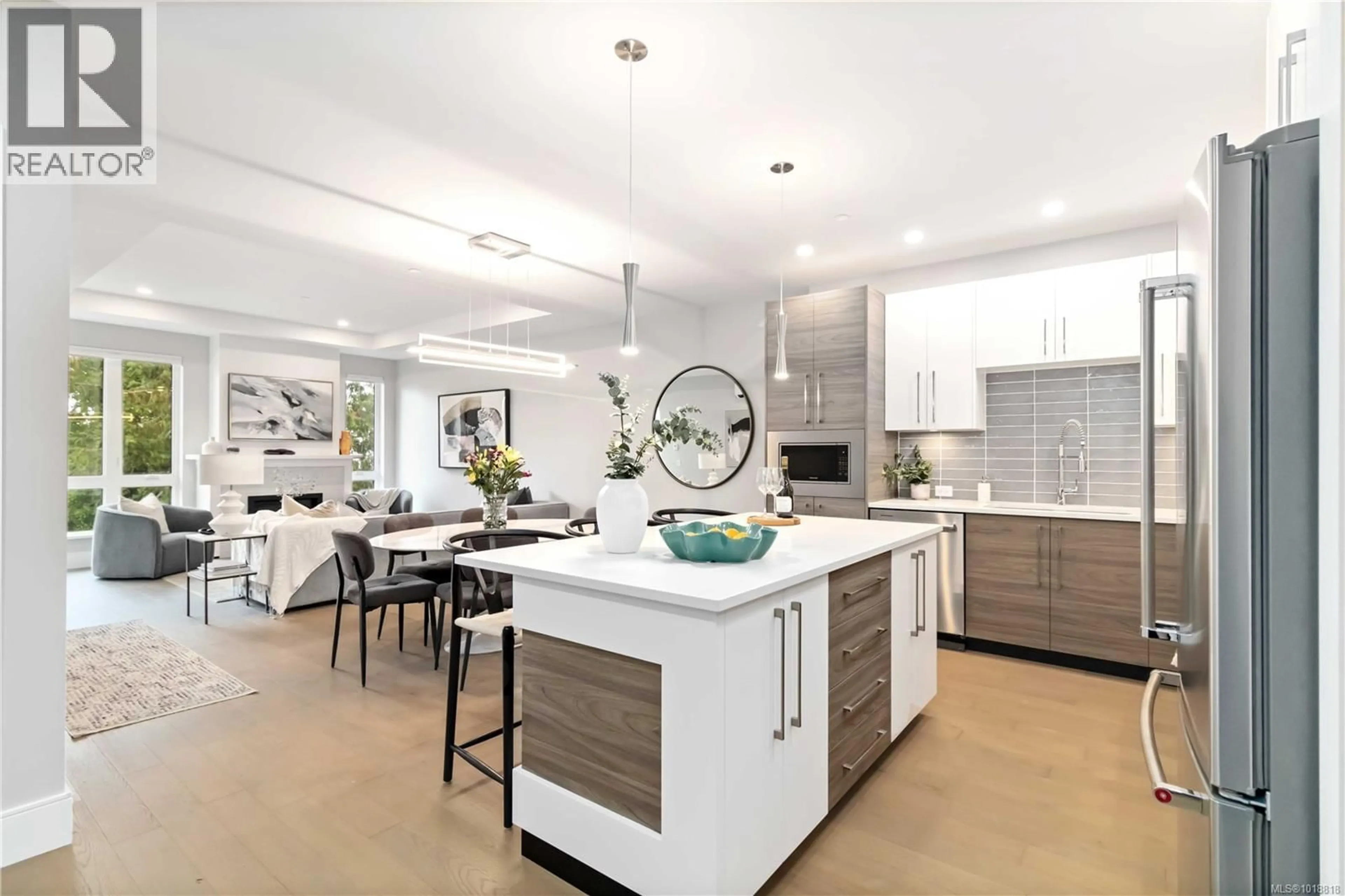 Open concept kitchen, ceramic/tile floor for 103 - 986 DOUMAC AVENUE, Saanich British Columbia V8Y1M4