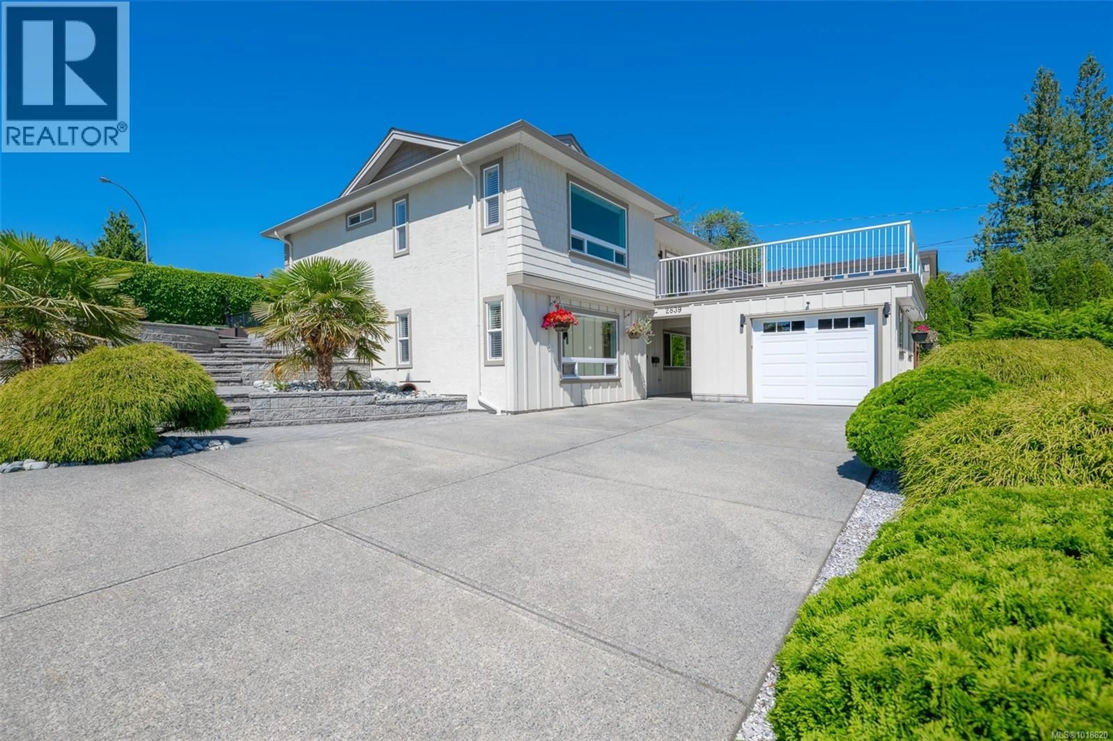 A pic from outside/outdoor area/front of a property/back of a property/a pic from drone, street for 2839 NEYLAND ROAD, Nanaimo British Columbia V9T3G2