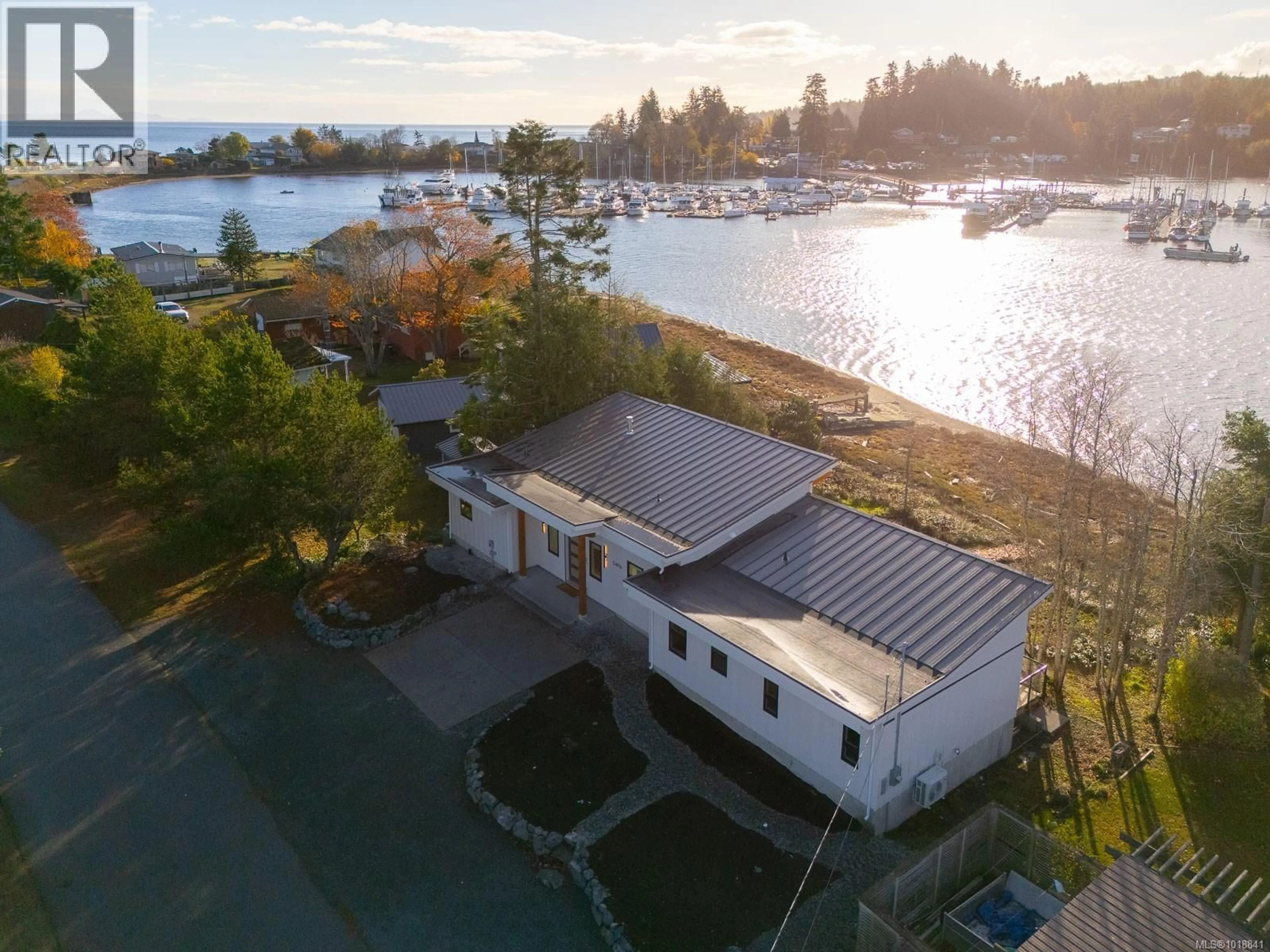 A pic from outside/outdoor area/front of a property/back of a property/a pic from drone, water/lake/river/ocean view for 5496 DEEP BAY DRIVE, Bowser British Columbia V0R1G9