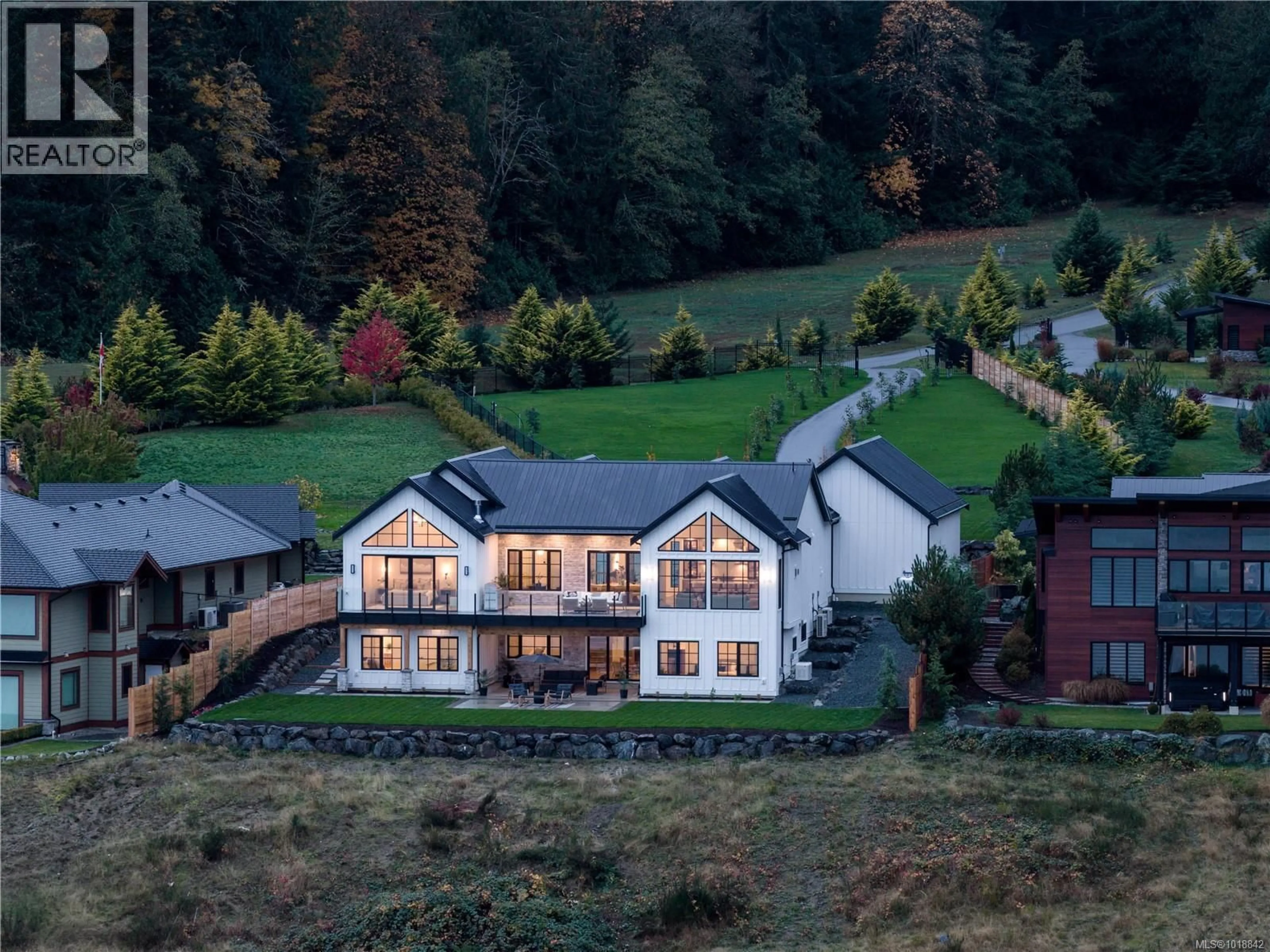 A pic from outside/outdoor area/front of a property/back of a property/a pic from drone, mountain view for 3080 BEACHFRONT CRESCENT, Mill Bay British Columbia V0R2P3