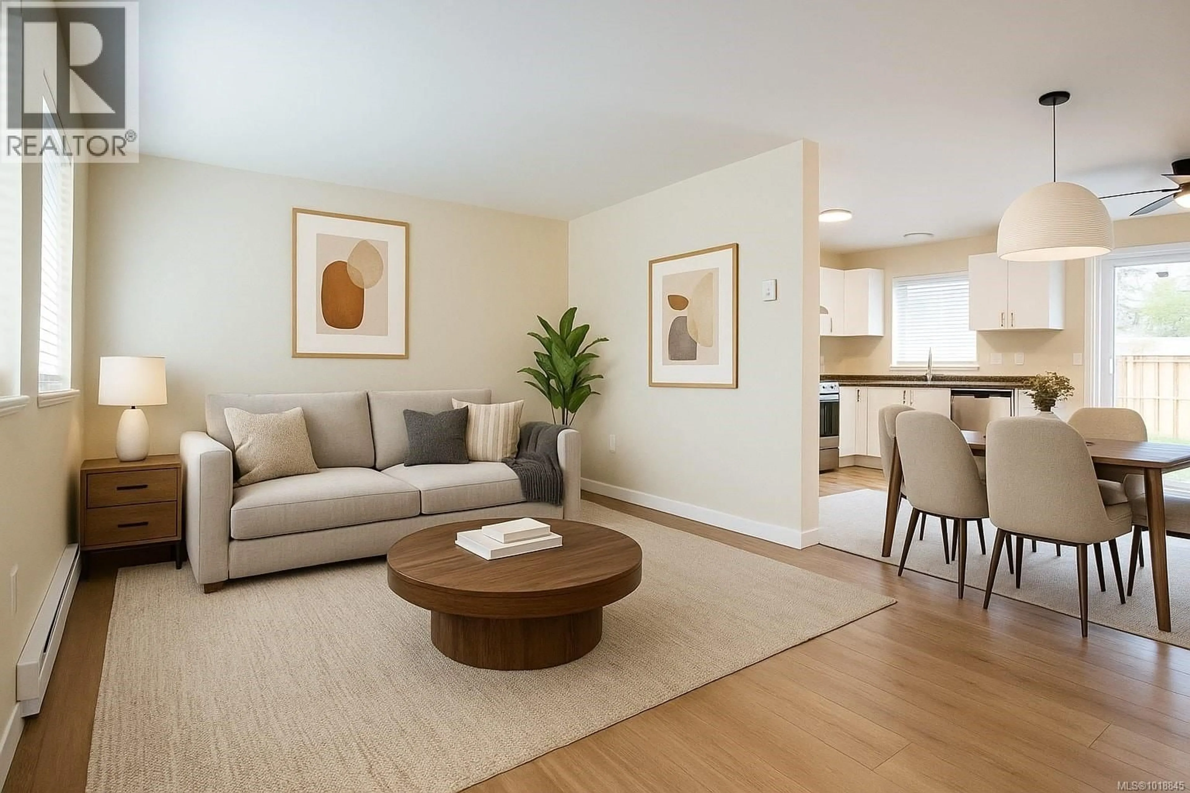 Living room with furniture, wood/laminate floor for 3430 TURNSTONE DRIVE, Langford British Columbia V9C0B4
