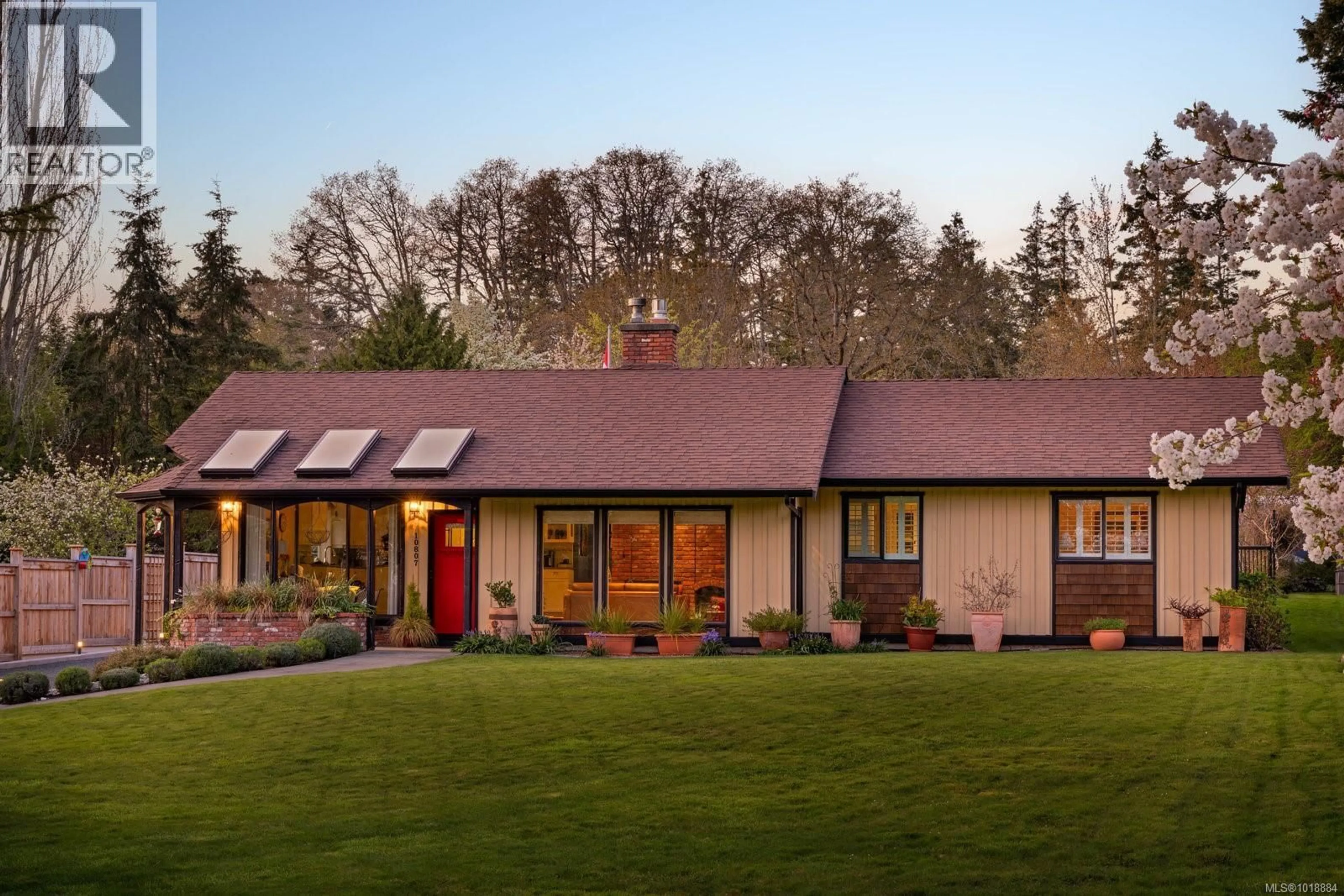 Home with brick exterior material, street for 10807 MADRONA DRIVE, North Saanich British Columbia V8L5P1