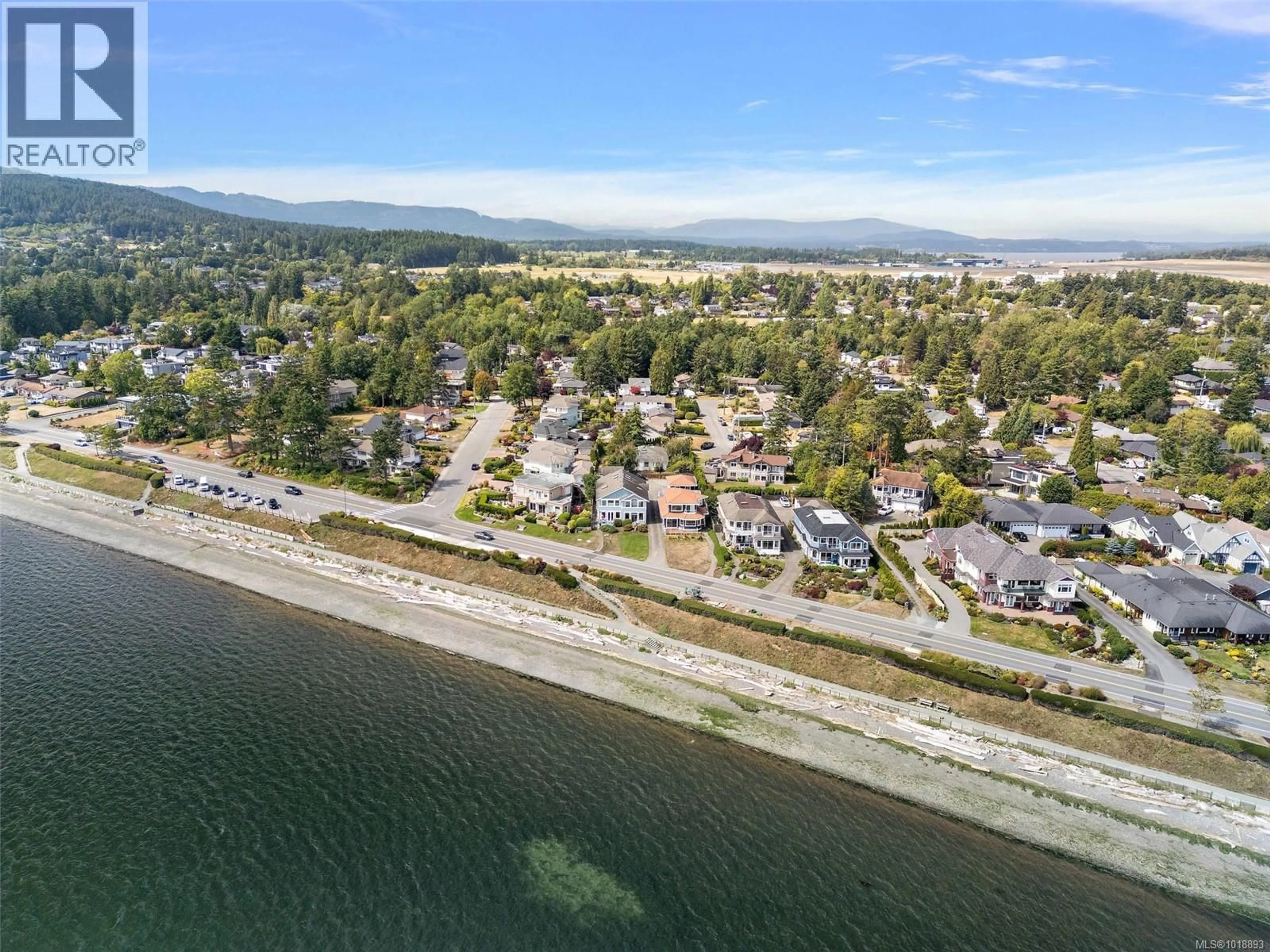 A pic from outside/outdoor area/front of a property/back of a property/a pic from drone, water/lake/river/ocean view for 9452 LOCHSIDE DRIVE, Sidney British Columbia V8L1N8