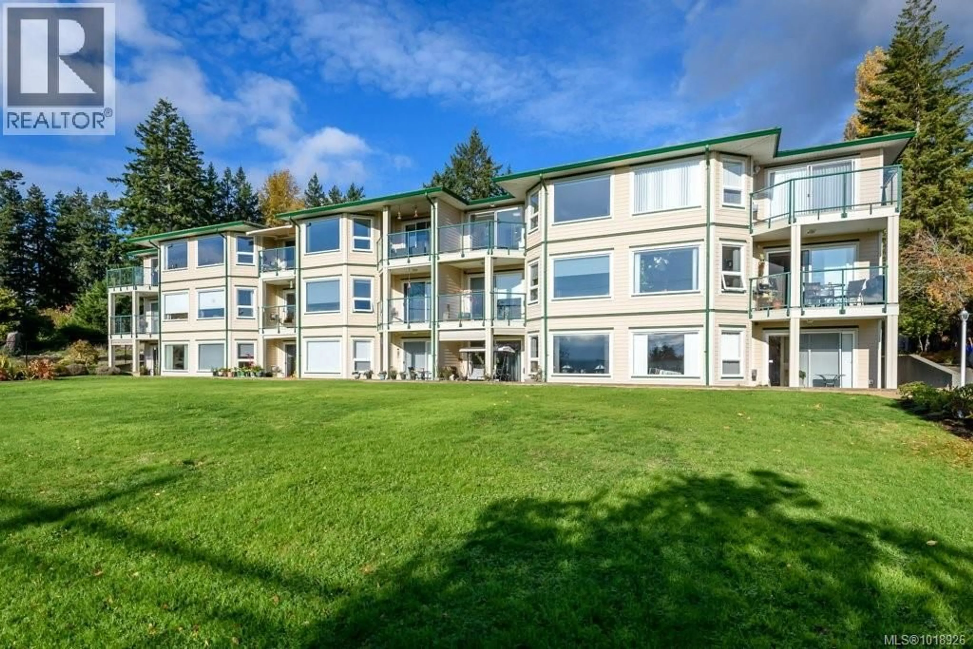 A pic from outside/outdoor area/front of a property/back of a property/a pic from drone, water/lake/river/ocean view for 14 - 1876 COMOX AVENUE, Comox British Columbia V9M3M7