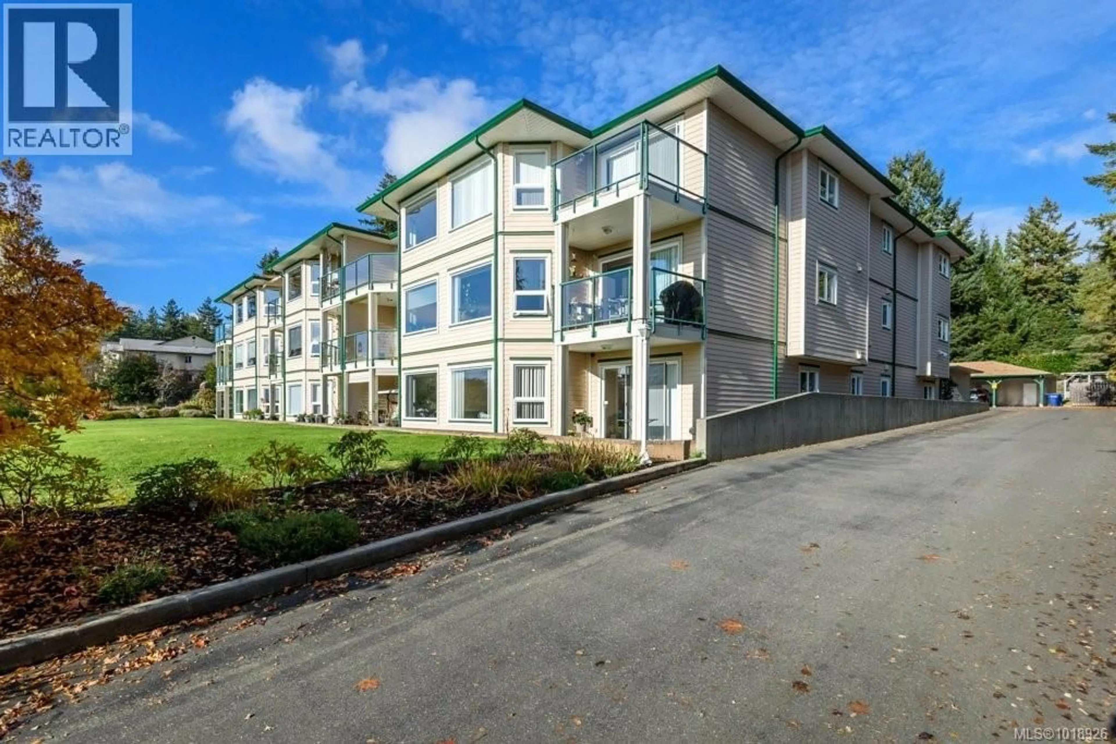 A pic from outside/outdoor area/front of a property/back of a property/a pic from drone, unknown for 14 - 1876 COMOX AVENUE, Comox British Columbia V9M3M7