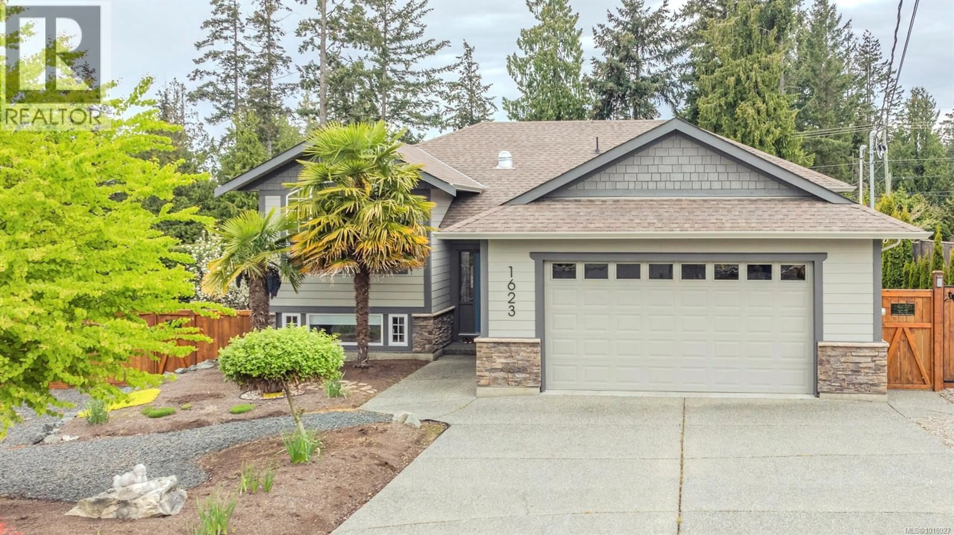 Home with vinyl exterior material, street for 1623 STONE LAKE DRIVE, Nanoose Bay British Columbia V9P9L1