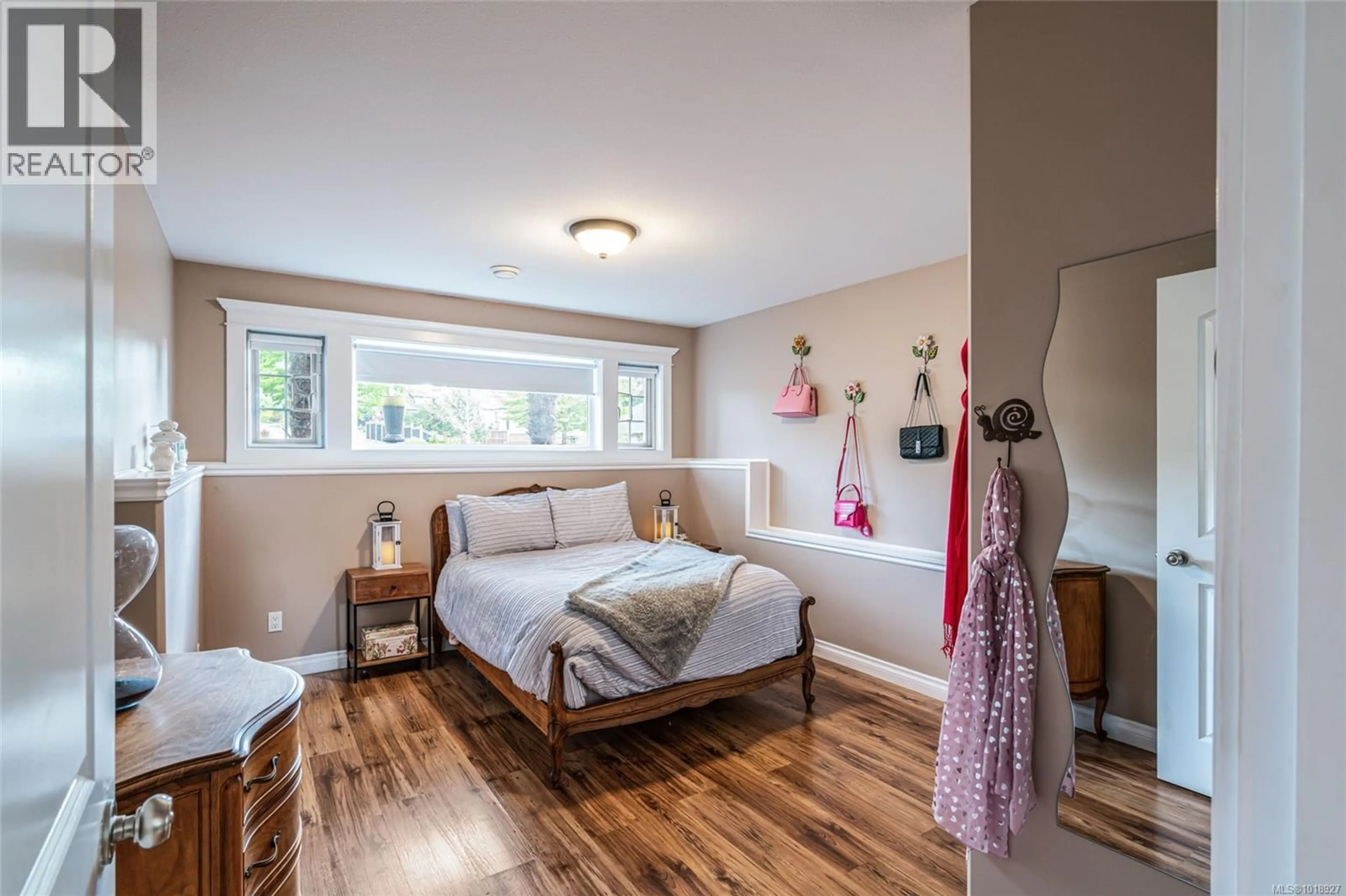 Bedroom with bed, wood/laminate floor for 1623 STONE LAKE DRIVE, Nanoose Bay British Columbia V9P9L1