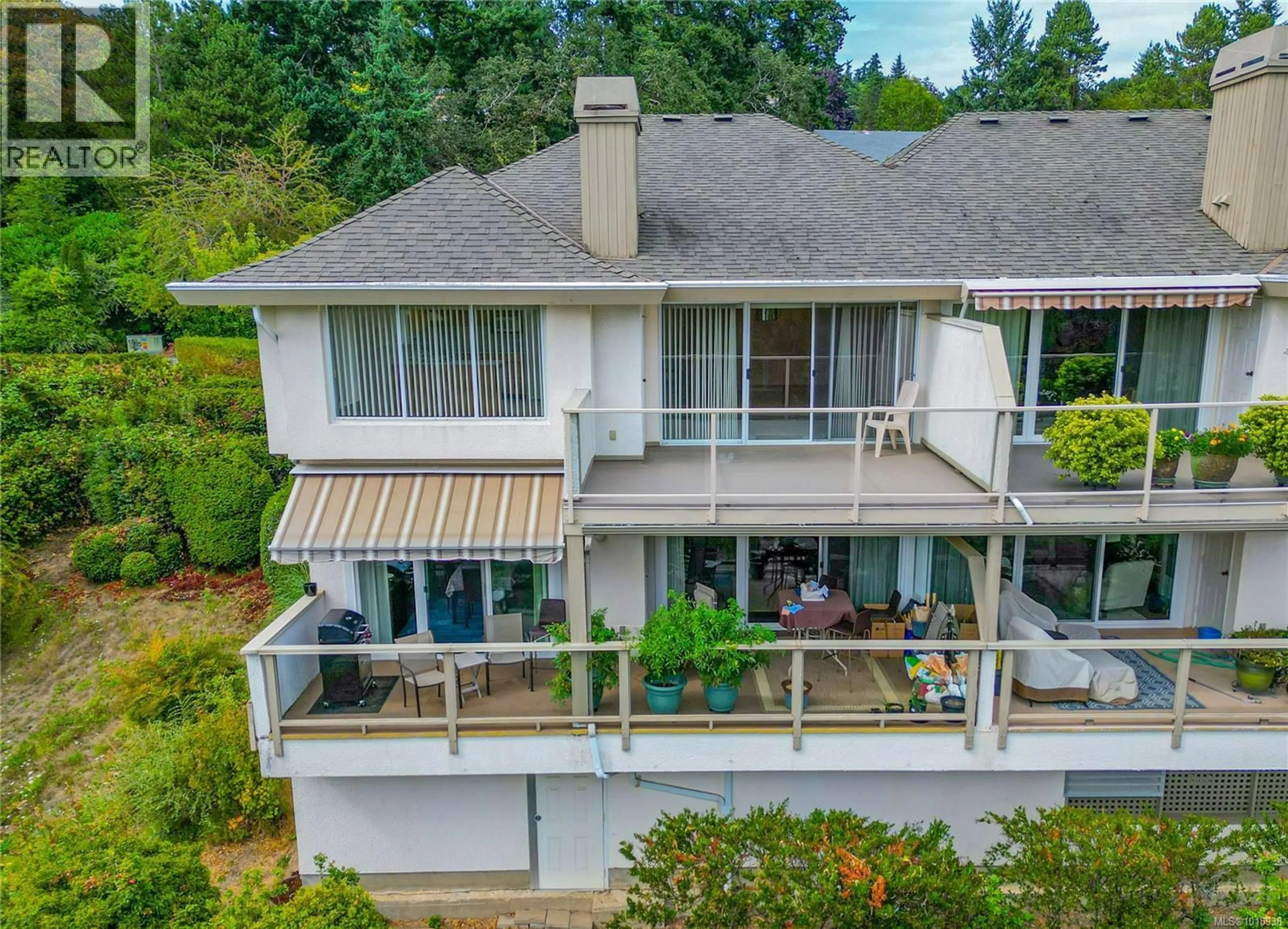 A pic from outside/outdoor area/front of a property/back of a property/a pic from drone, water/lake/river/ocean view for 8 - 895 ROYAL OAK AVENUE, Saanich British Columbia V8X3T3