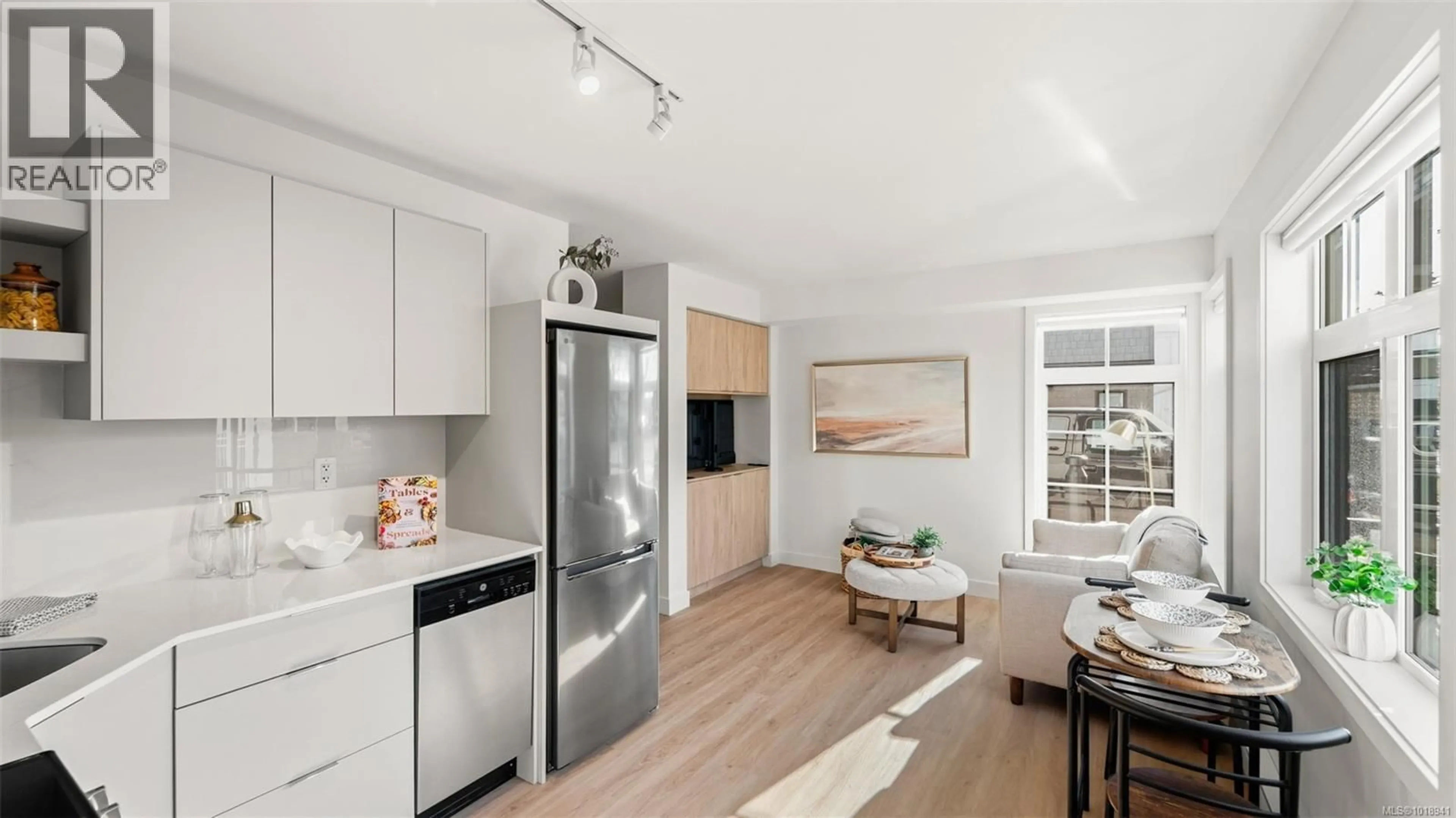 Open concept kitchen, wood/laminate floor for 2202 - 4201 TYNDALL AVENUE, Saanich British Columbia V8N0C4