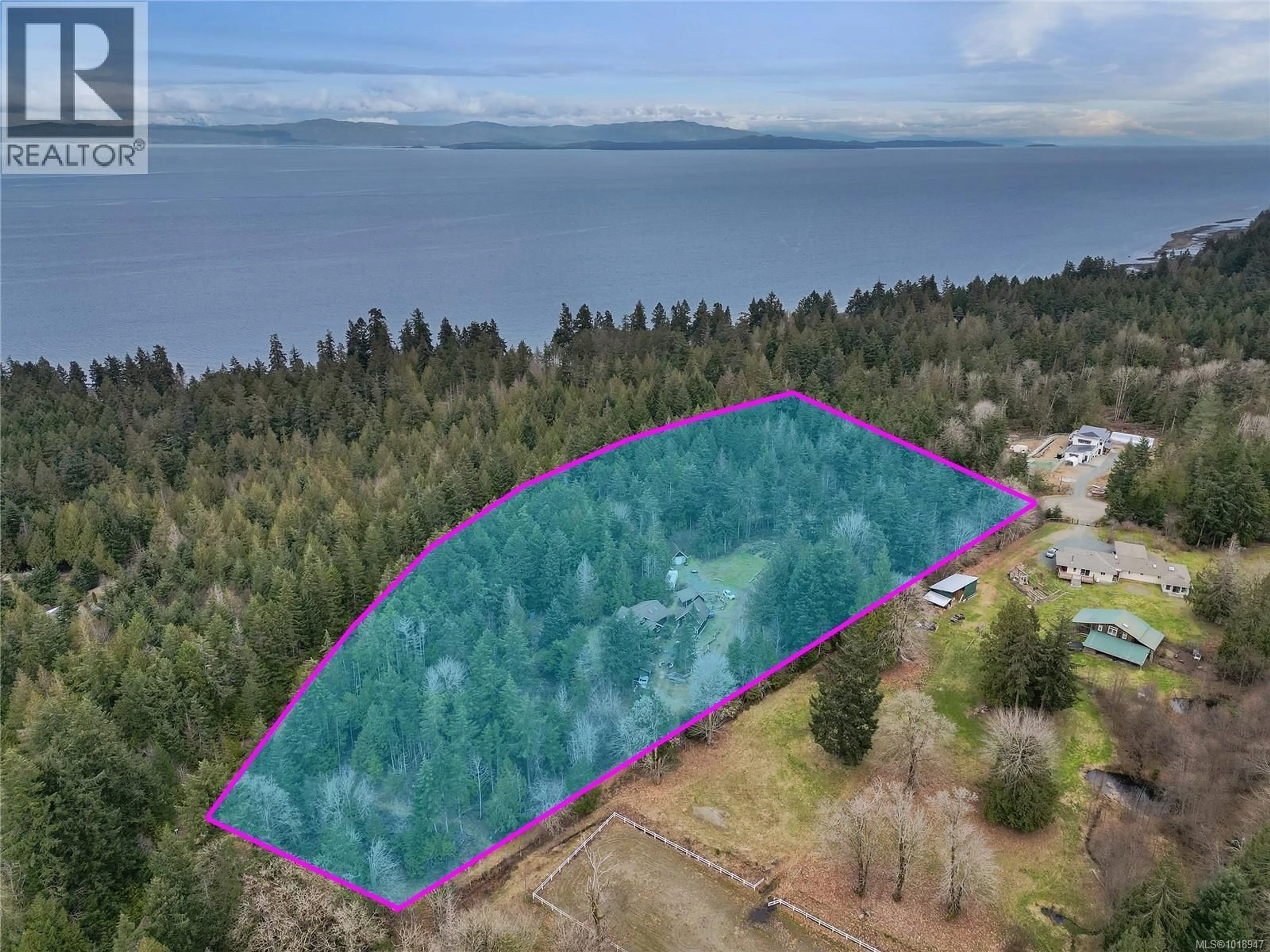 A pic from outside/outdoor area/front of a property/back of a property/a pic from drone, water/lake/river/ocean view for 300 BONSAI PLACE, Qualicum Beach British Columbia V9K2A6