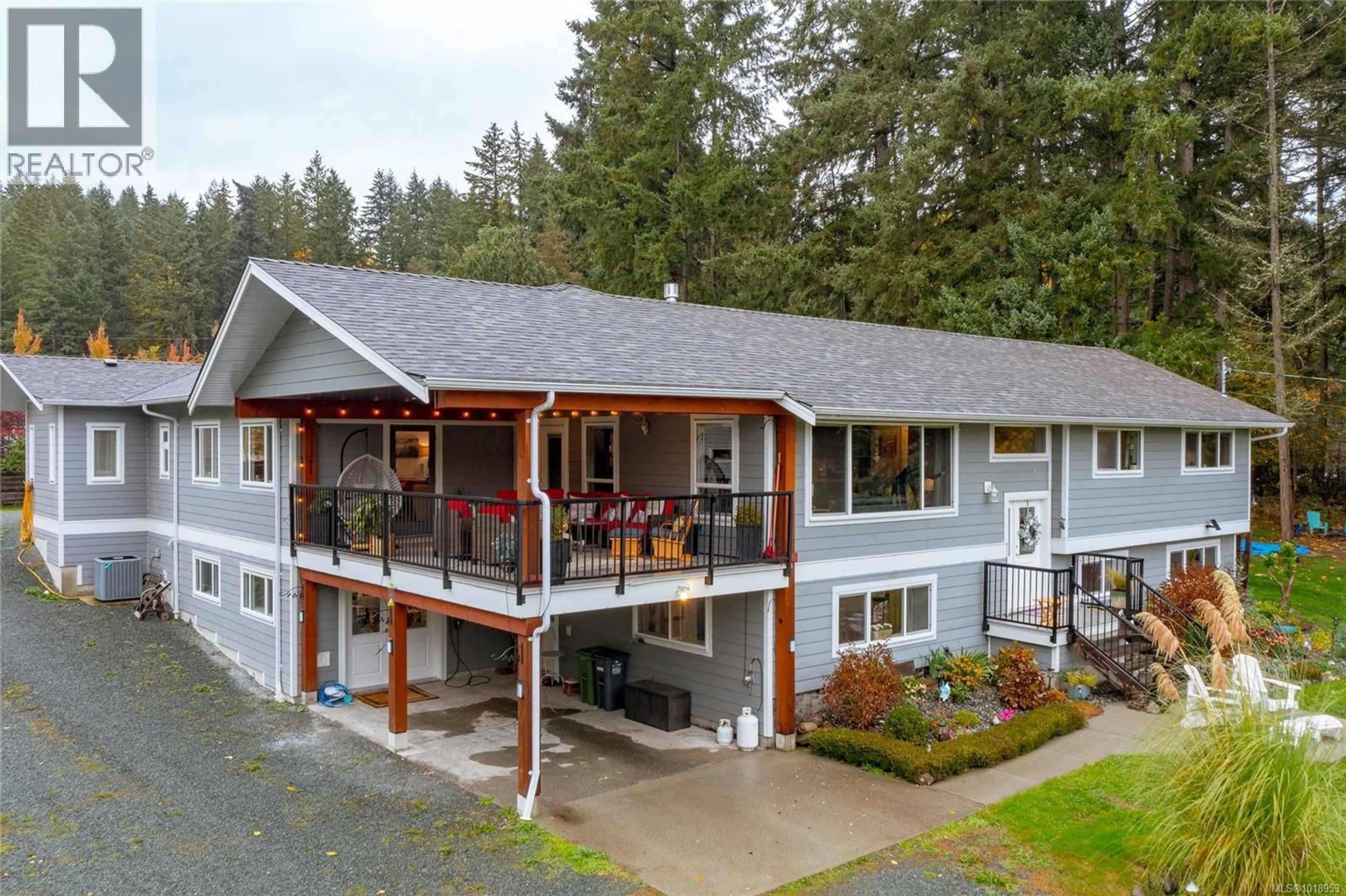 A pic from outside/outdoor area/front of a property/back of a property/a pic from drone, unknown for 1597 HERD ROAD, Duncan British Columbia V9L5W6