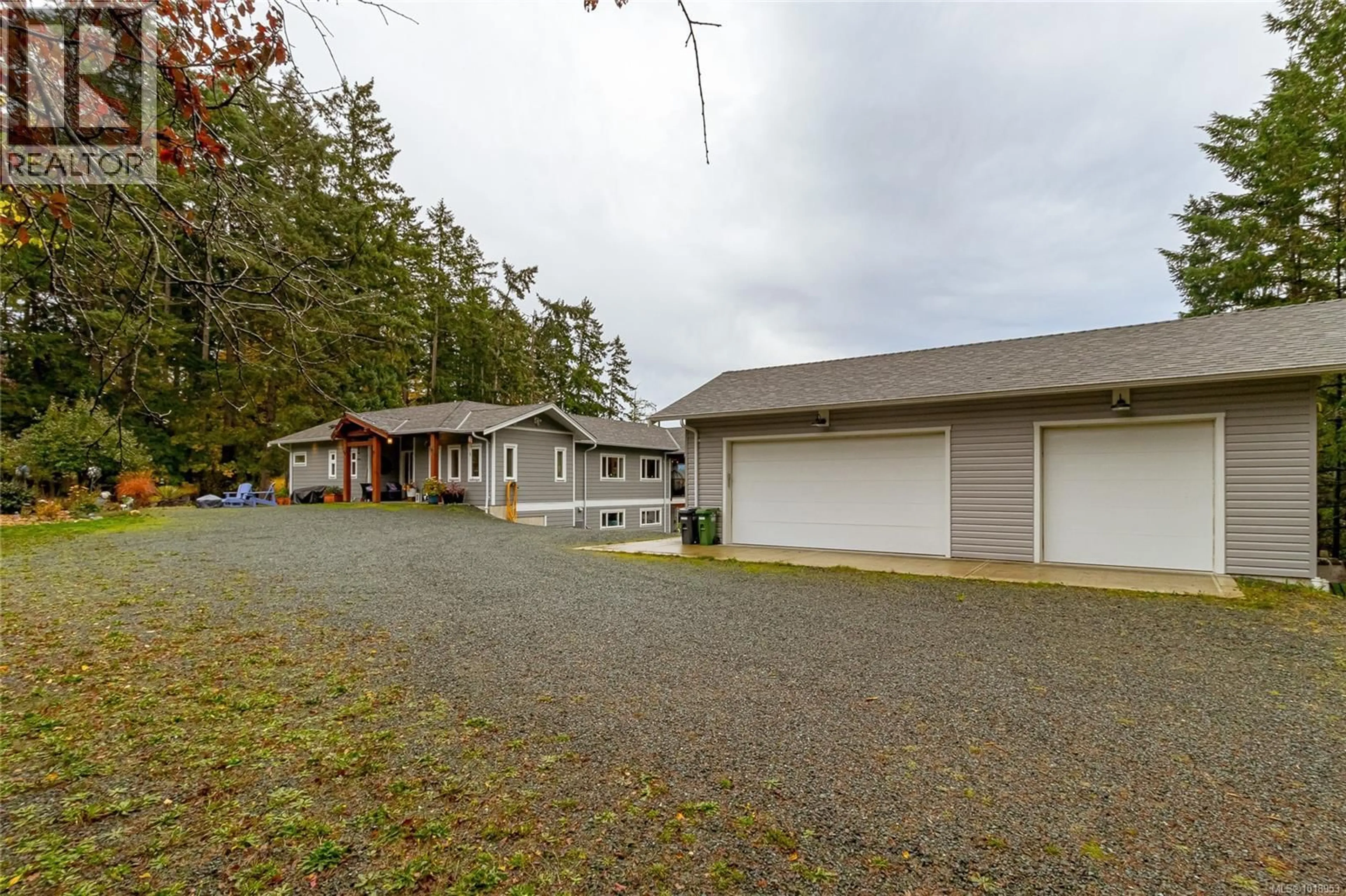 A pic from outside/outdoor area/front of a property/back of a property/a pic from drone, street for 1597 HERD ROAD, Duncan British Columbia V9L5W6