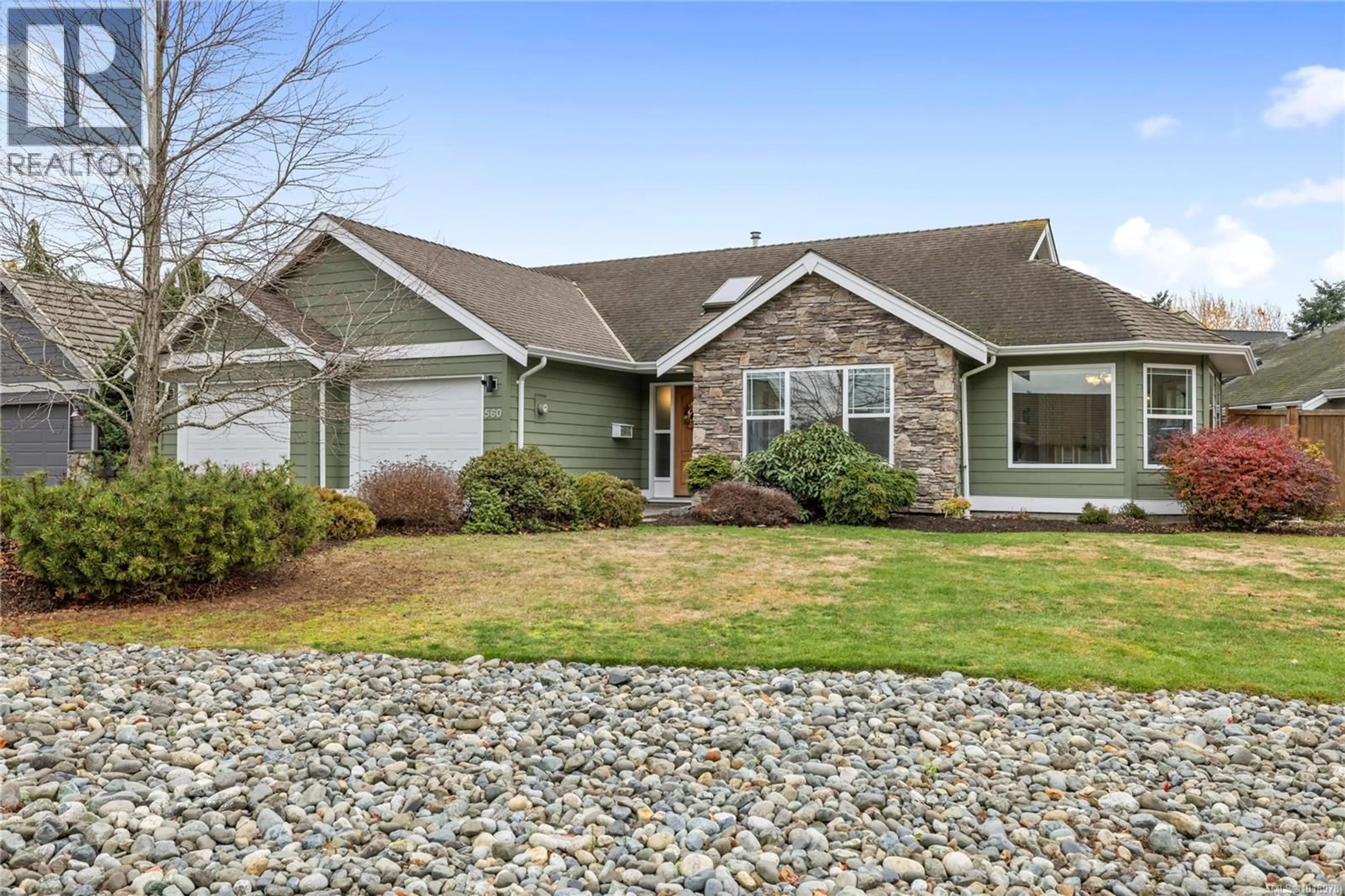 Home with vinyl exterior material, street for 560 VIKING WAY, French Creek British Columbia V9P2Z5