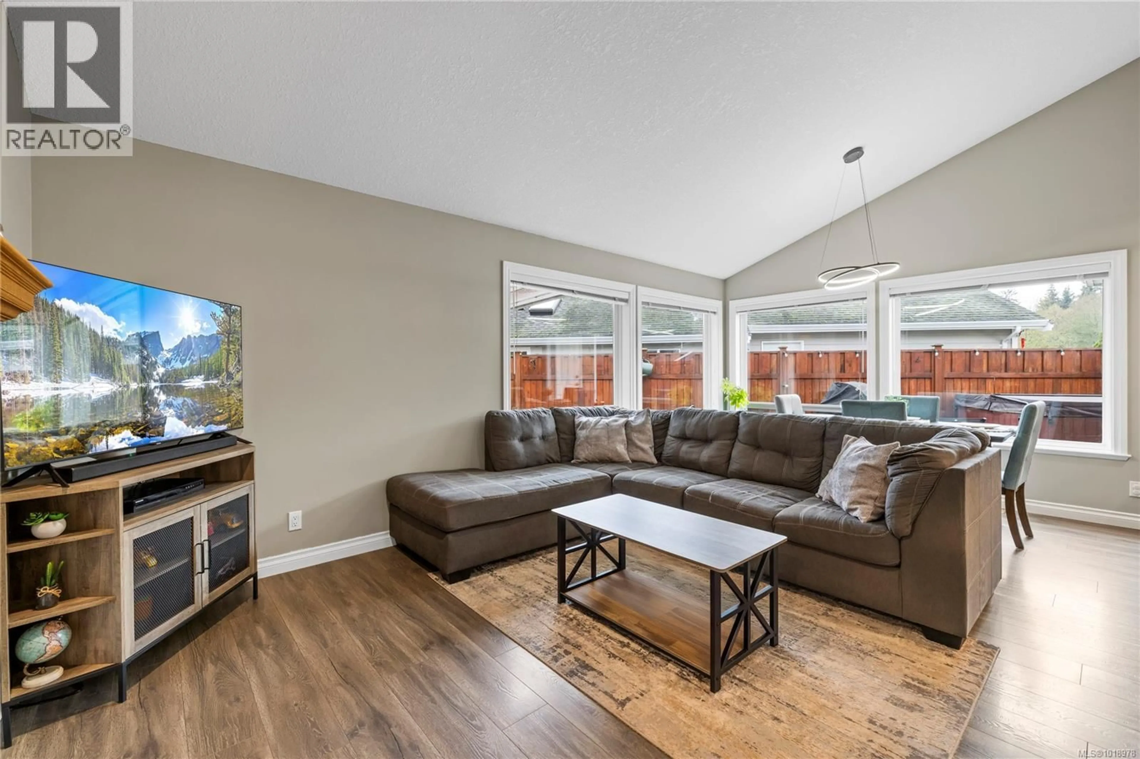 Living room with furniture, unknown for 560 VIKING WAY, French Creek British Columbia V9P2Z5