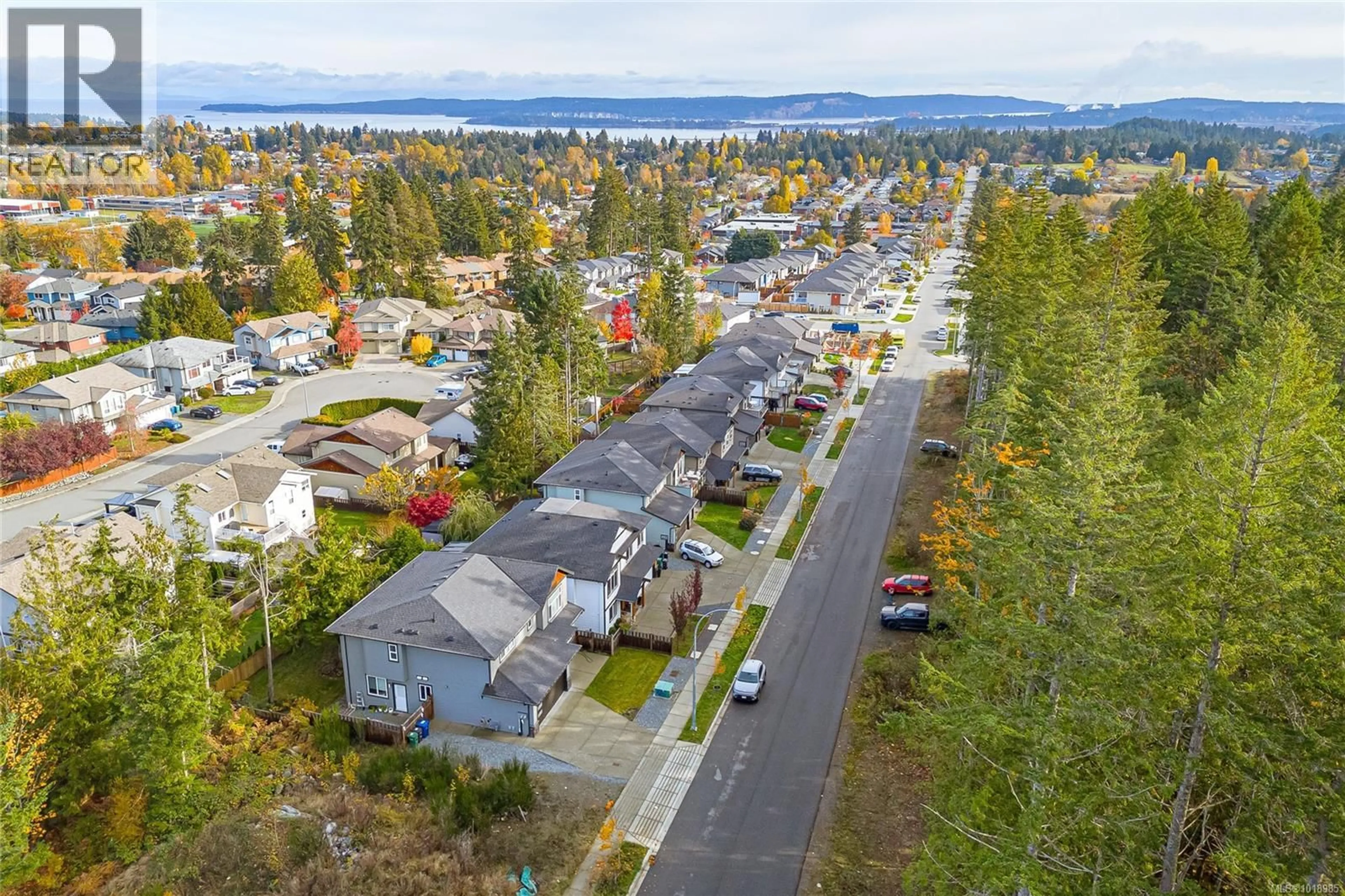 A pic from outside/outdoor area/front of a property/back of a property/a pic from drone, street for 668 EIGHTH STREET, Nanaimo British Columbia V9R0L1