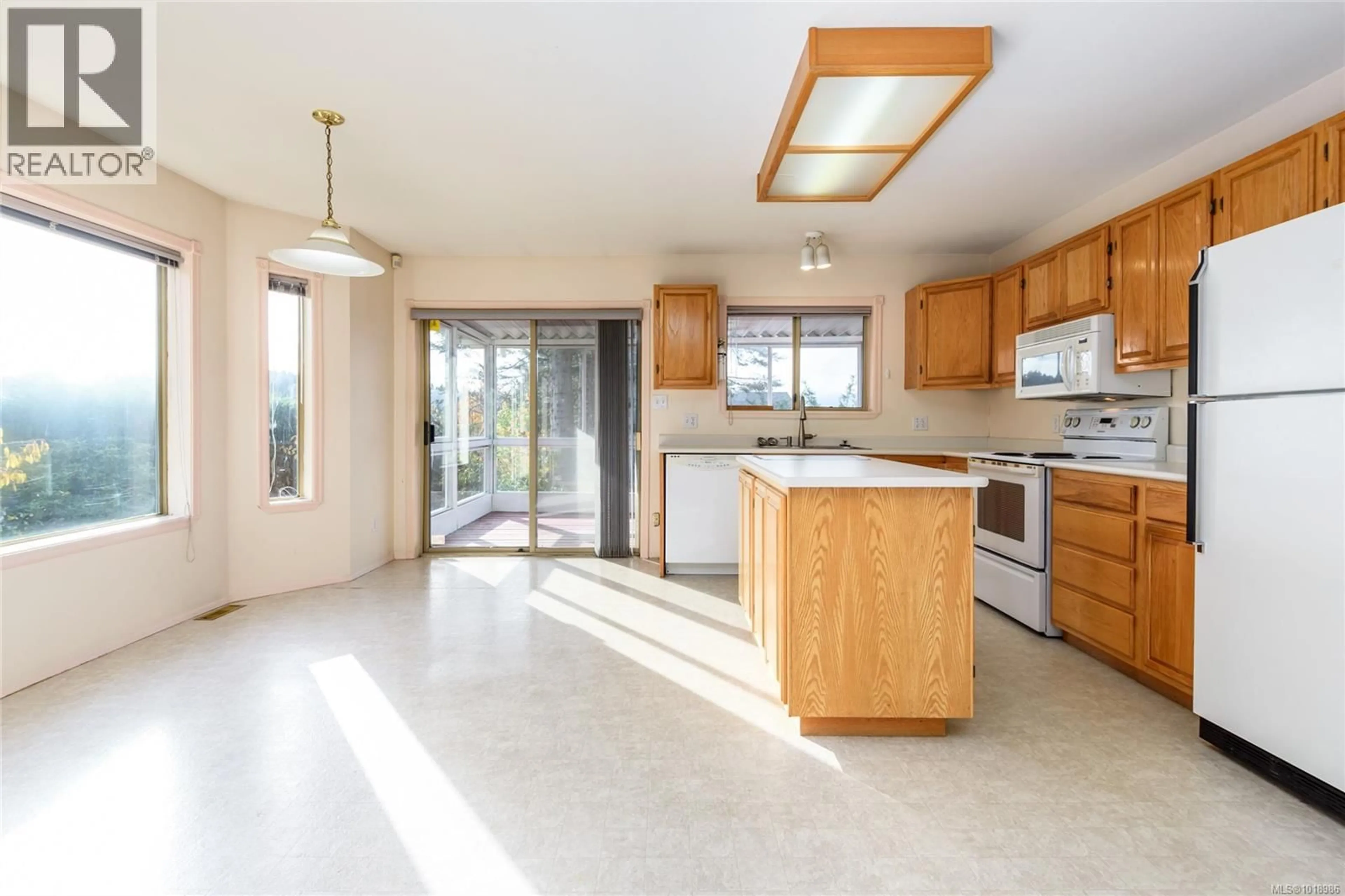 Open concept kitchen, ceramic/tile floor for 2475 VALLEY VIEW DRIVE, Courtenay British Columbia V9N8S5