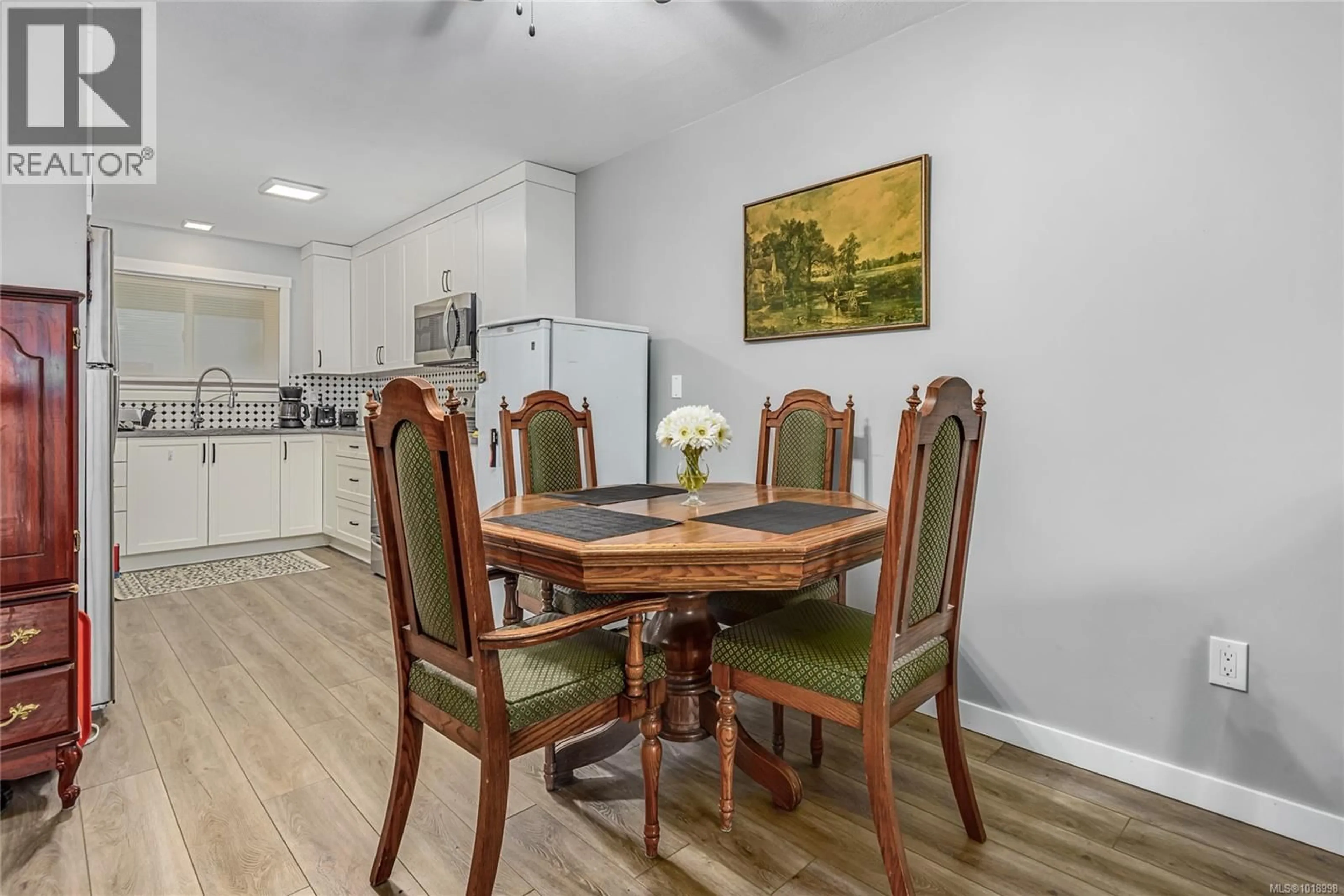 Dining room, wood/laminate floor for 219 - 1540 PIERCY AVENUE, Courtenay British Columbia V9N3E9