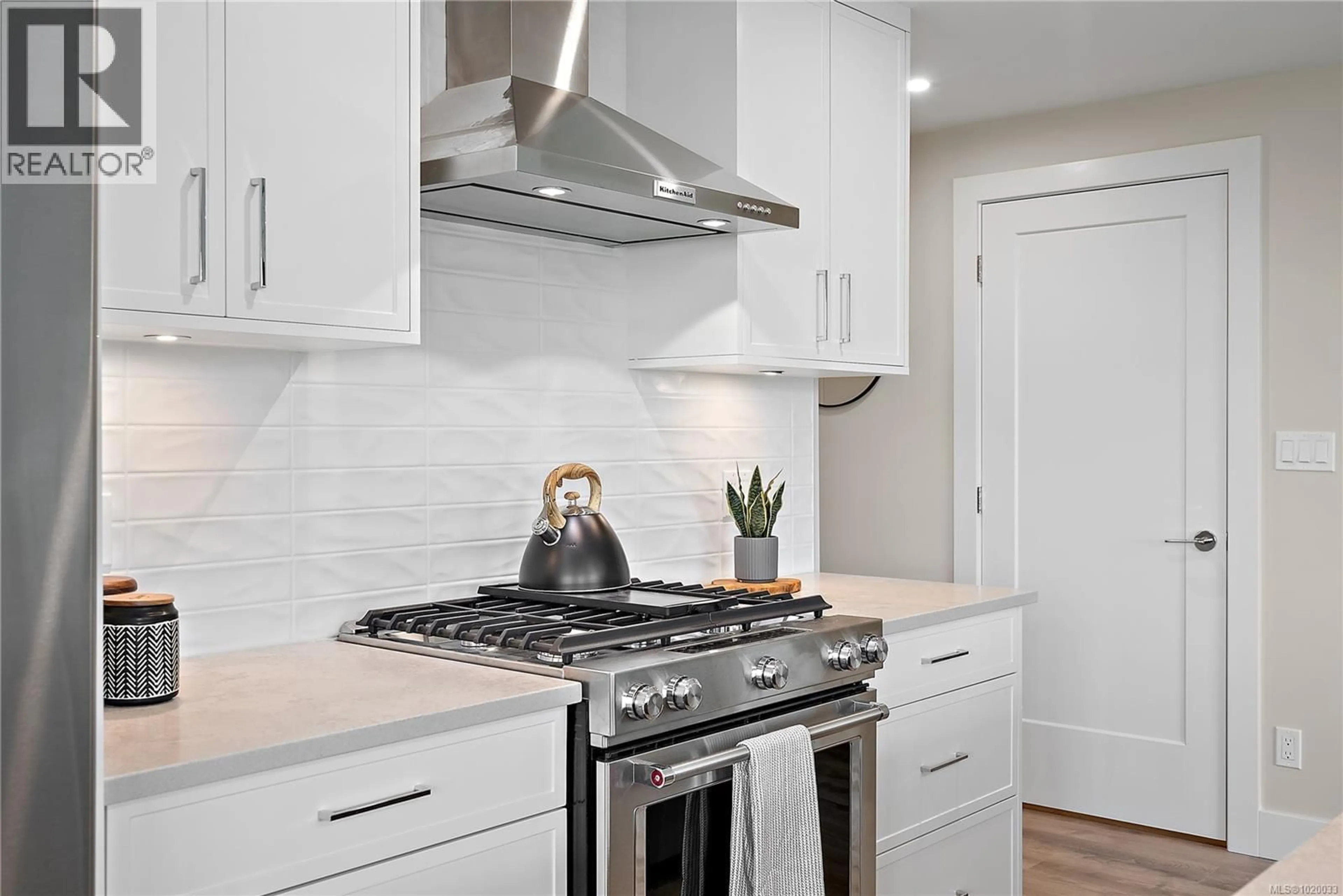 Contemporary kitchen, ceramic/tile floor for 101 - 2520 HACKETT CRESCENT, Central Saanich British Columbia V8M0B9