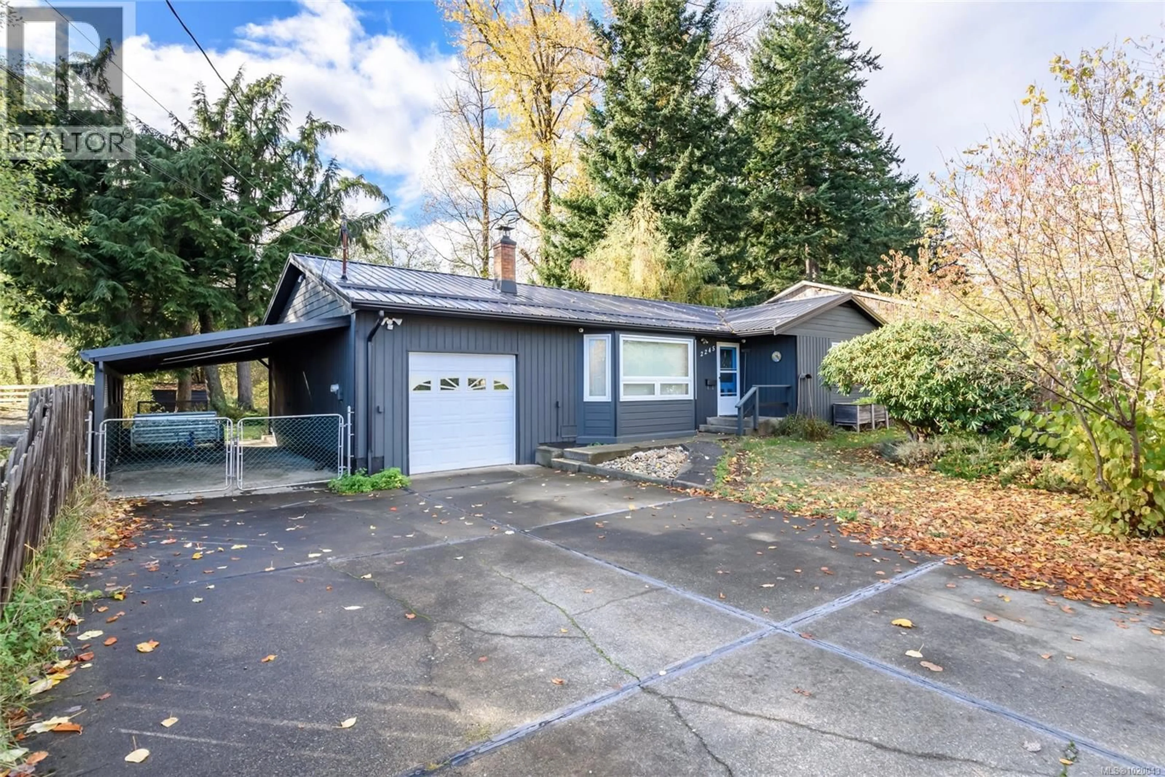 Home with vinyl exterior material, street for 2245 COUSINS AVENUE, Courtenay British Columbia V9N3N6