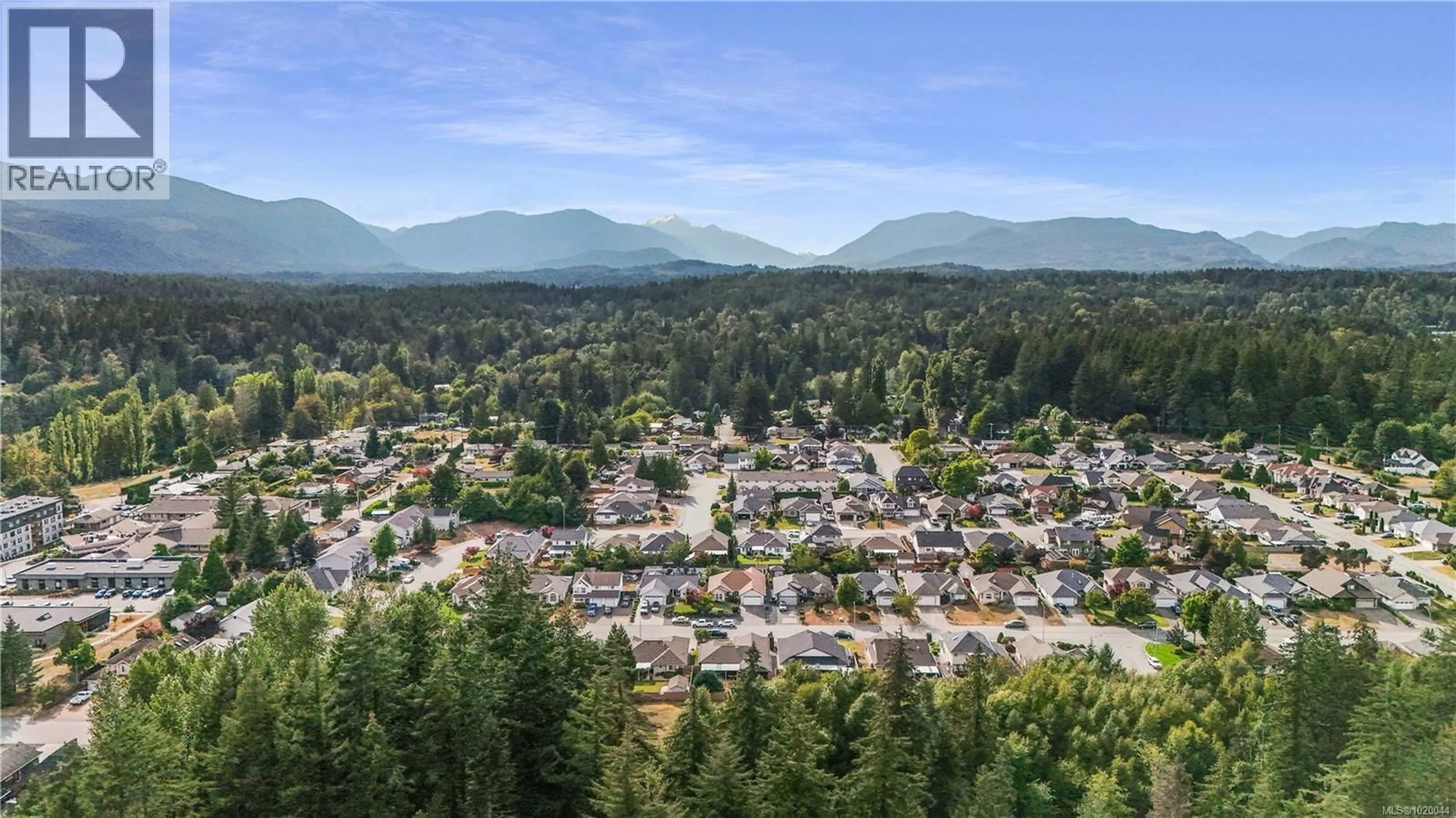 A pic from outside/outdoor area/front of a property/back of a property/a pic from drone, mountain view for 5575 WOODLAND CRESCENT EAST, Port Alberni British Columbia V9Y8E6