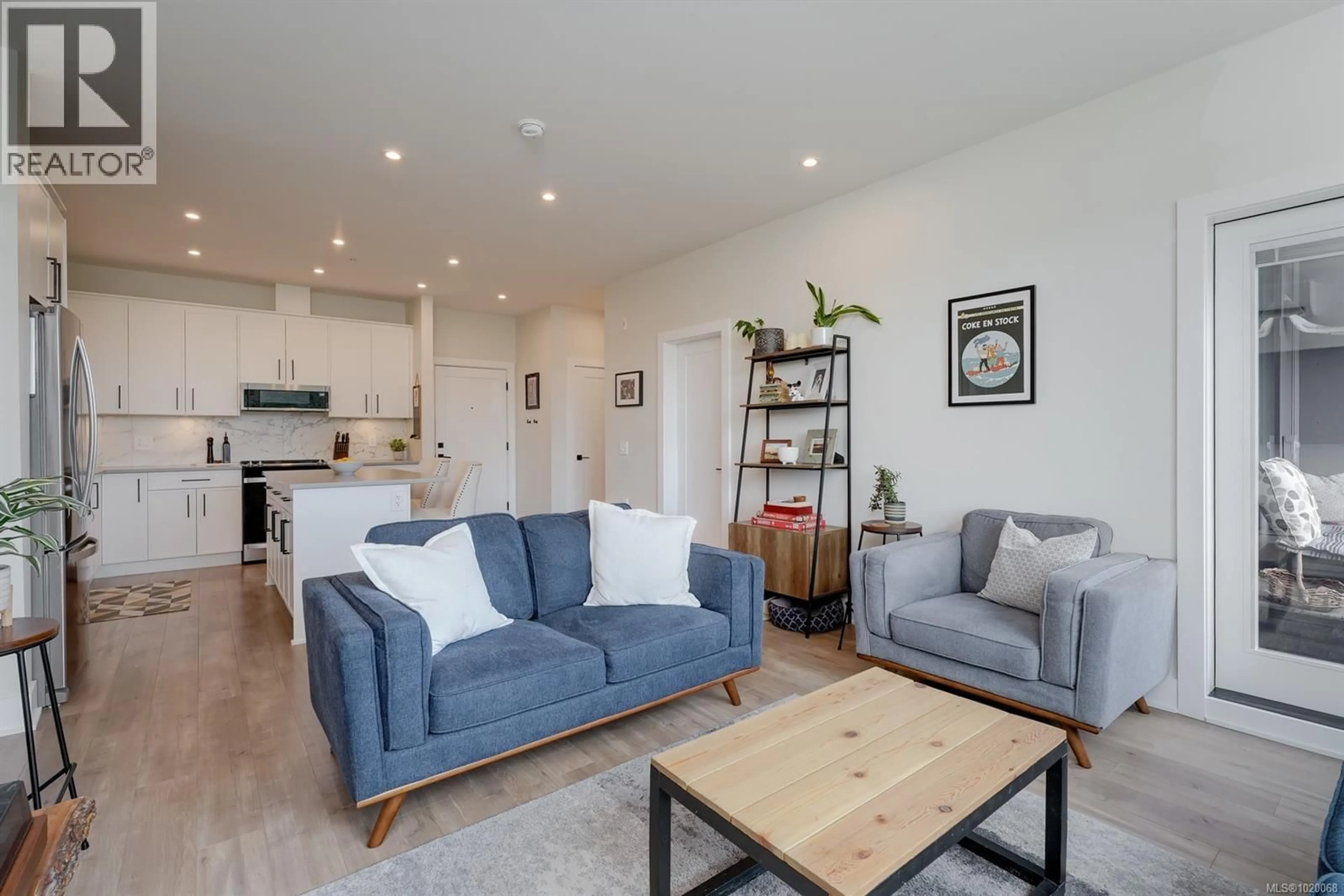 Living room with furniture, wood/laminate floor for 605 - 1361 GOLDSTREAM AVENUE, Langford British Columbia V9B2W2