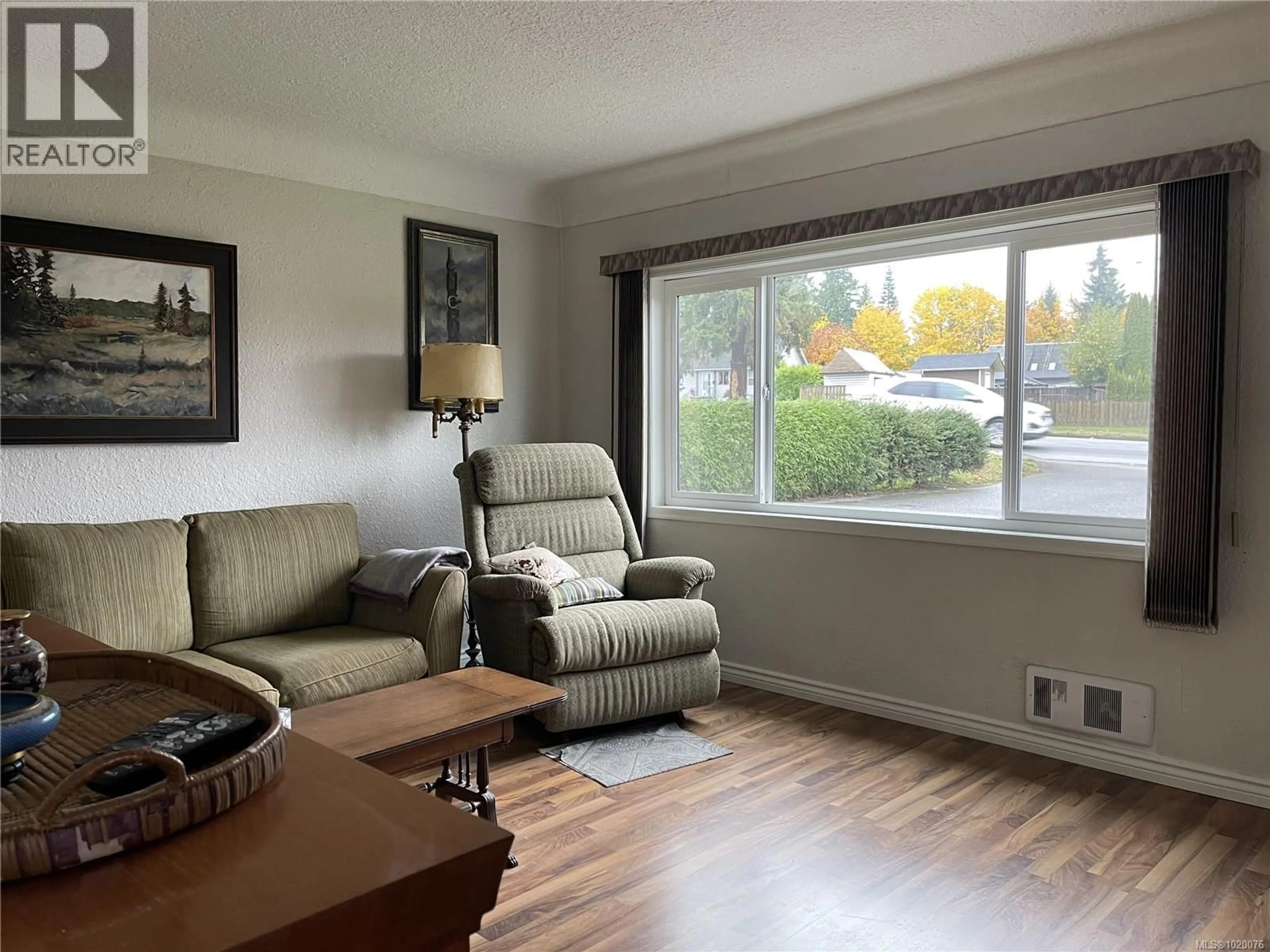 Living room with furniture, wood/laminate floor for 4301 ARROWSMITH ROAD, Port Alberni British Columbia V9Y5P5