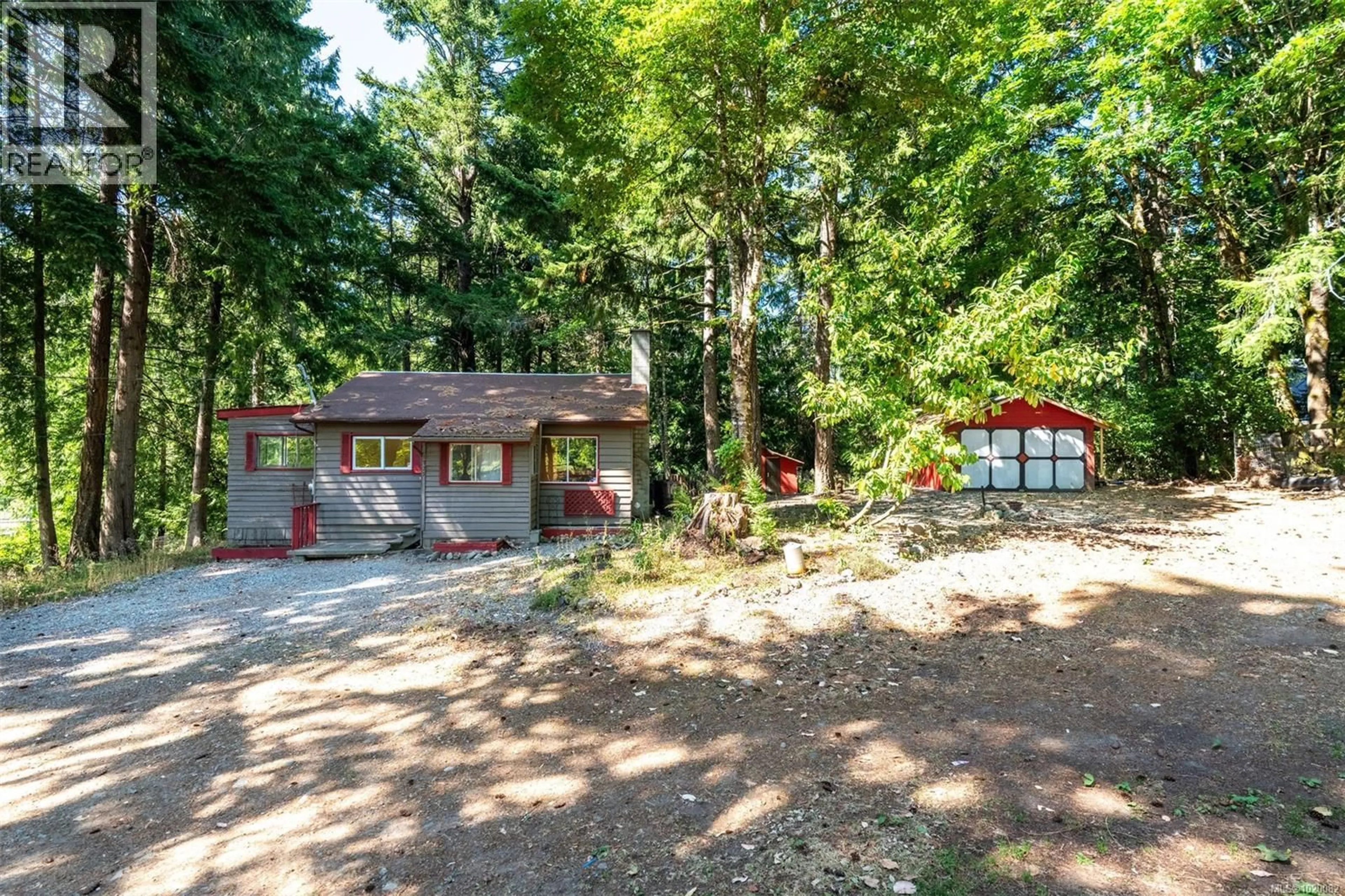 A pic from outside/outdoor area/front of a property/back of a property/a pic from drone, forest/trees view for 1725 ELFORD ROAD, Shawnigan Lake British Columbia V8H2A7