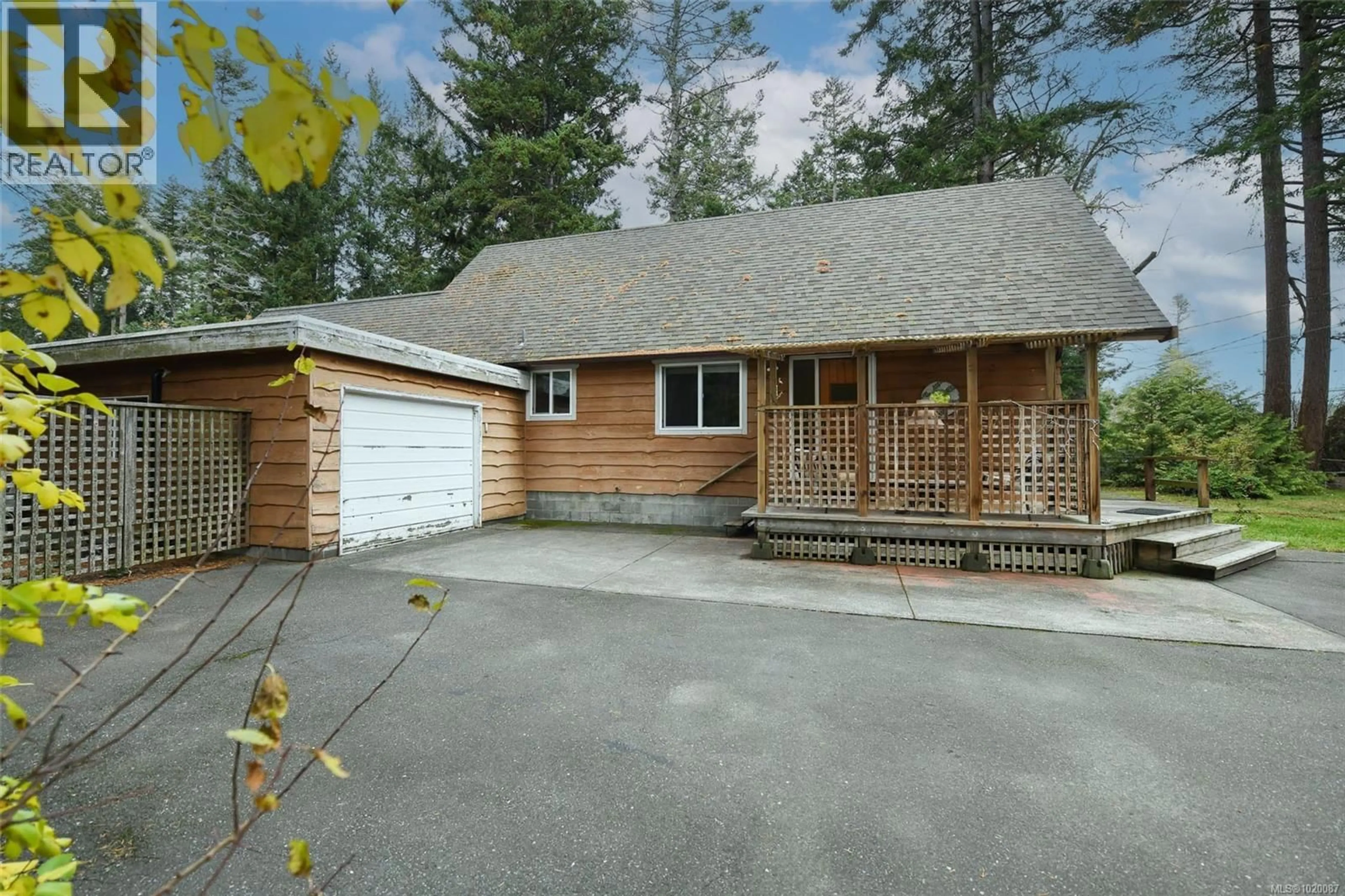 Home with vinyl exterior material, street for 1210 WILKINSON ROAD, Comox British Columbia V9M4B8