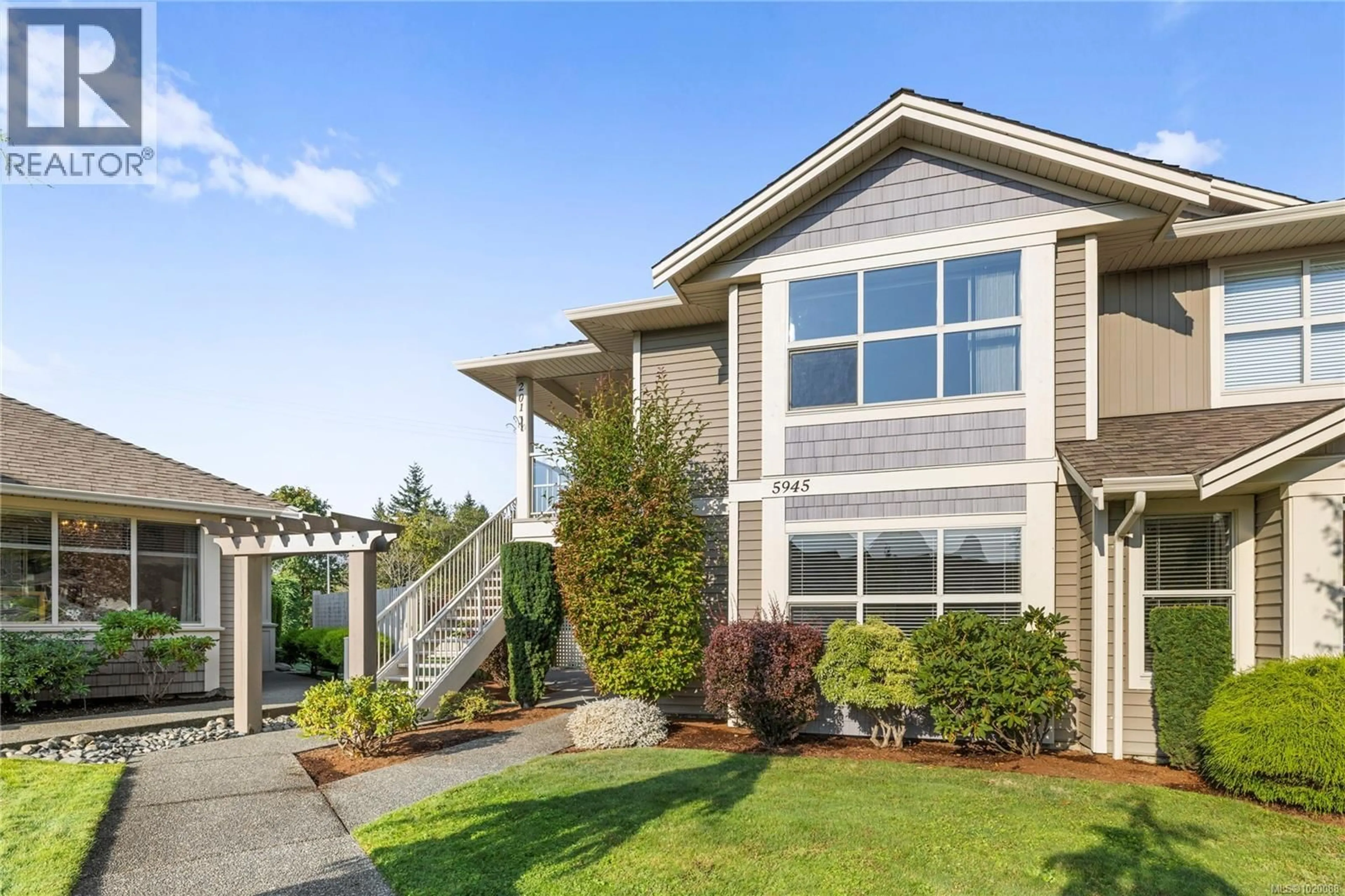 Home with vinyl exterior material, street for 201 - 5945 KADEN PLACE, Nanaimo British Columbia V9T0B5