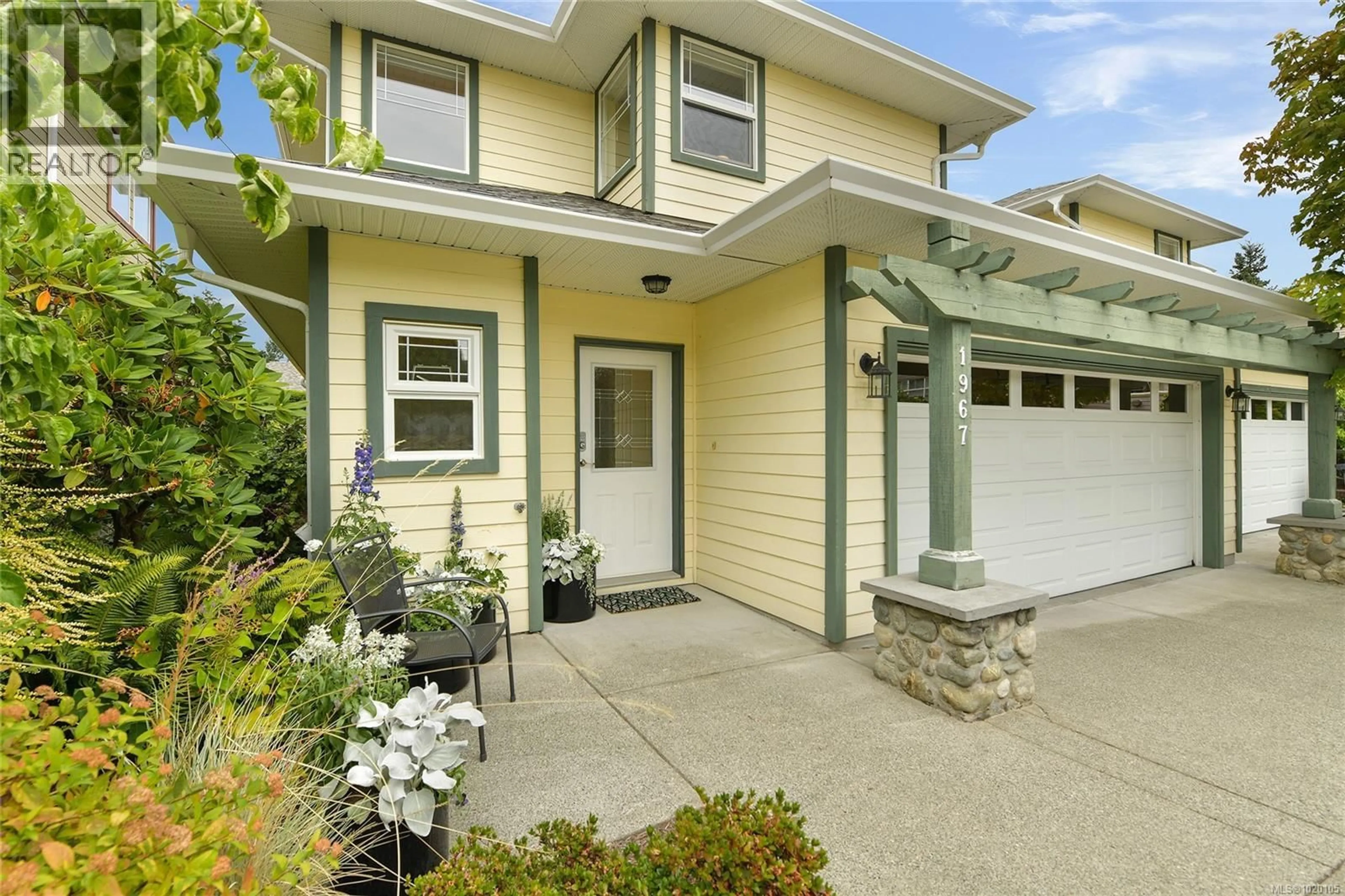 Home with vinyl exterior material, street for 1967 POLO PARK COURT, Central Saanich British Columbia V8M2K1