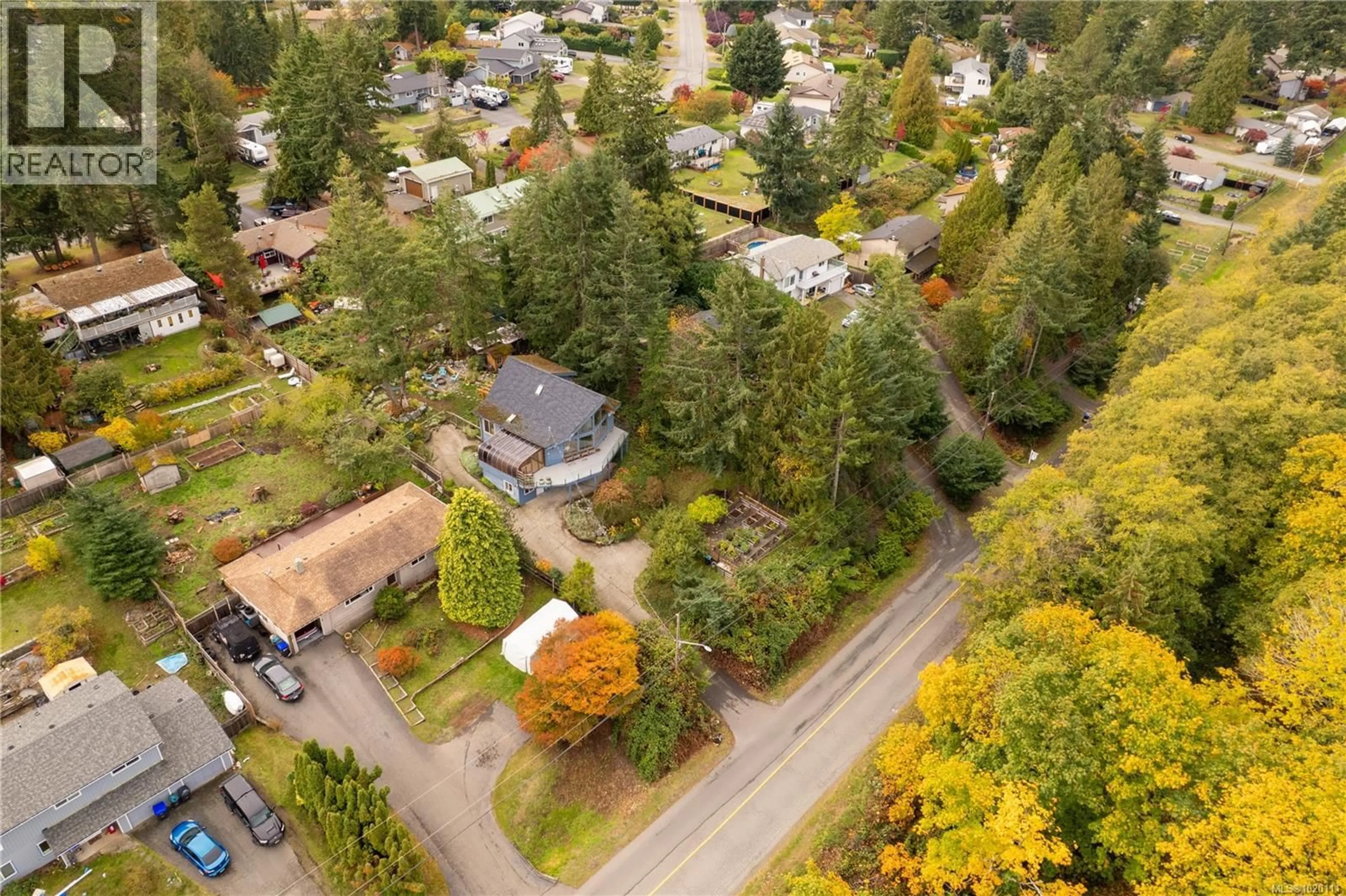 A pic from outside/outdoor area/front of a property/back of a property/a pic from drone, street for 6869 PHILIP ROAD, Lantzville British Columbia V0R2H0