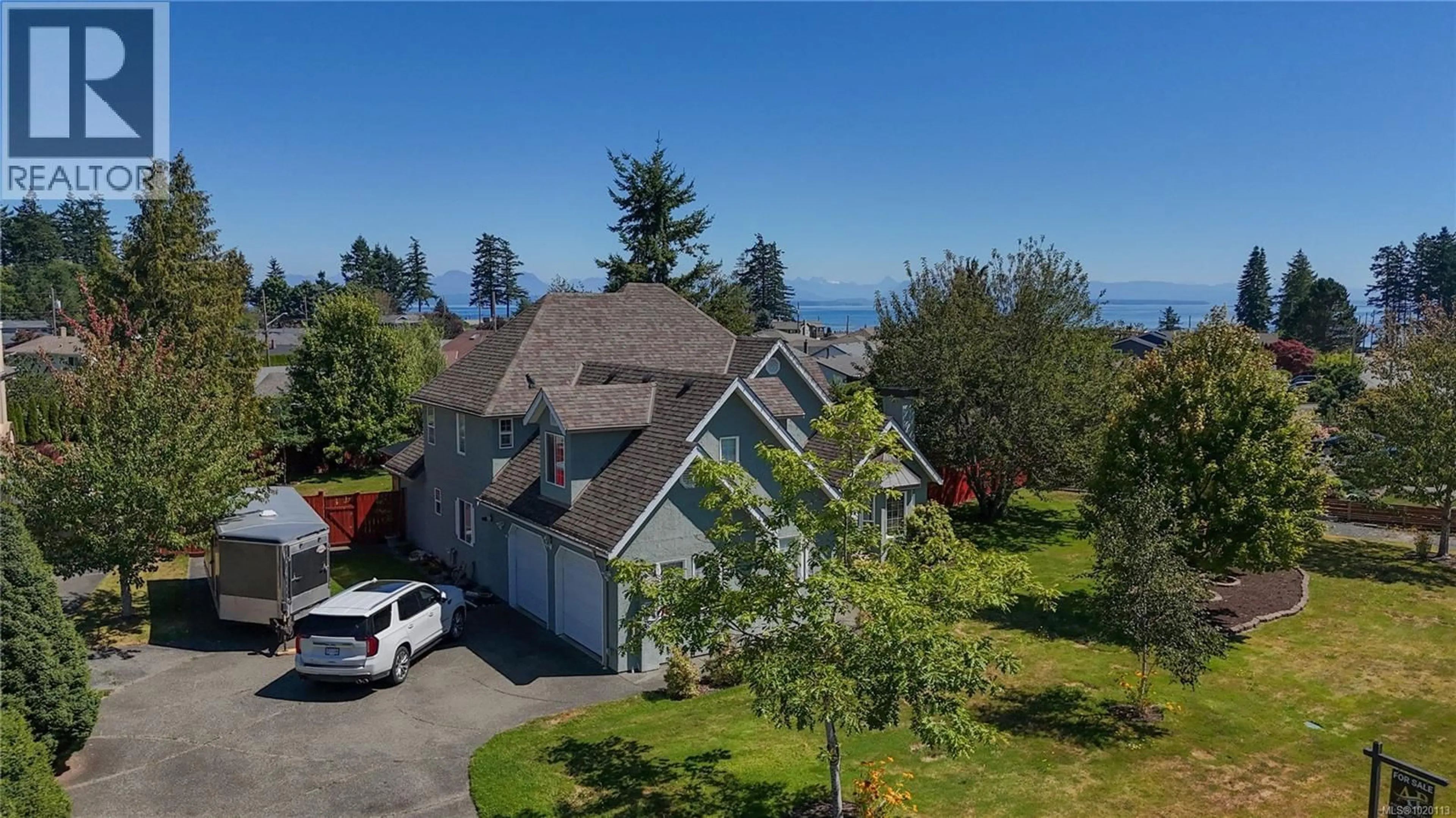 A pic from outside/outdoor area/front of a property/back of a property/a pic from drone, mountain view for 270 DAHL ROAD, Campbell River British Columbia V9W7X8