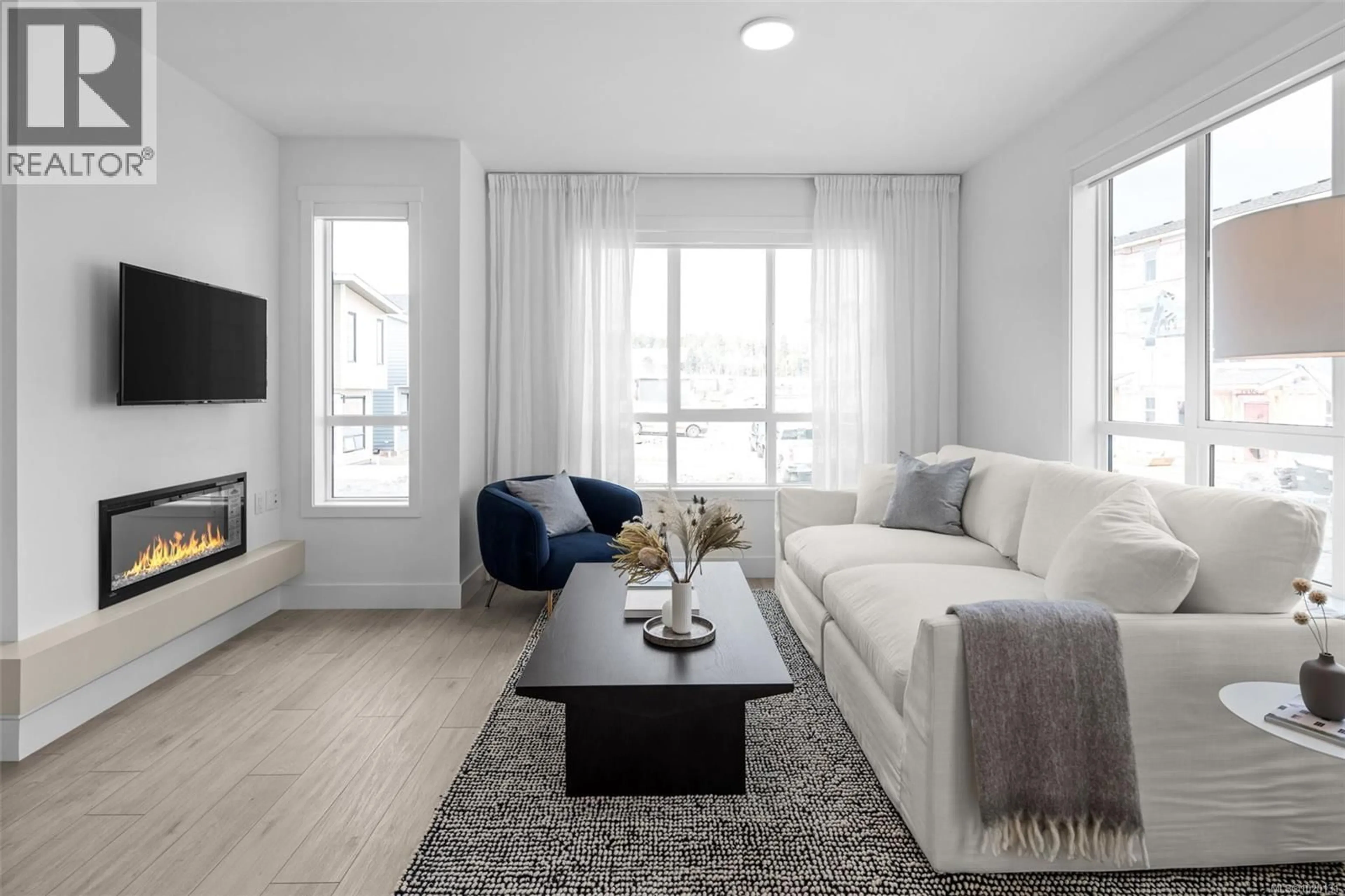 Living room with furniture, unknown for 121 - 368 TRADEWINDS AVENUE, Colwood British Columbia V9C0S5