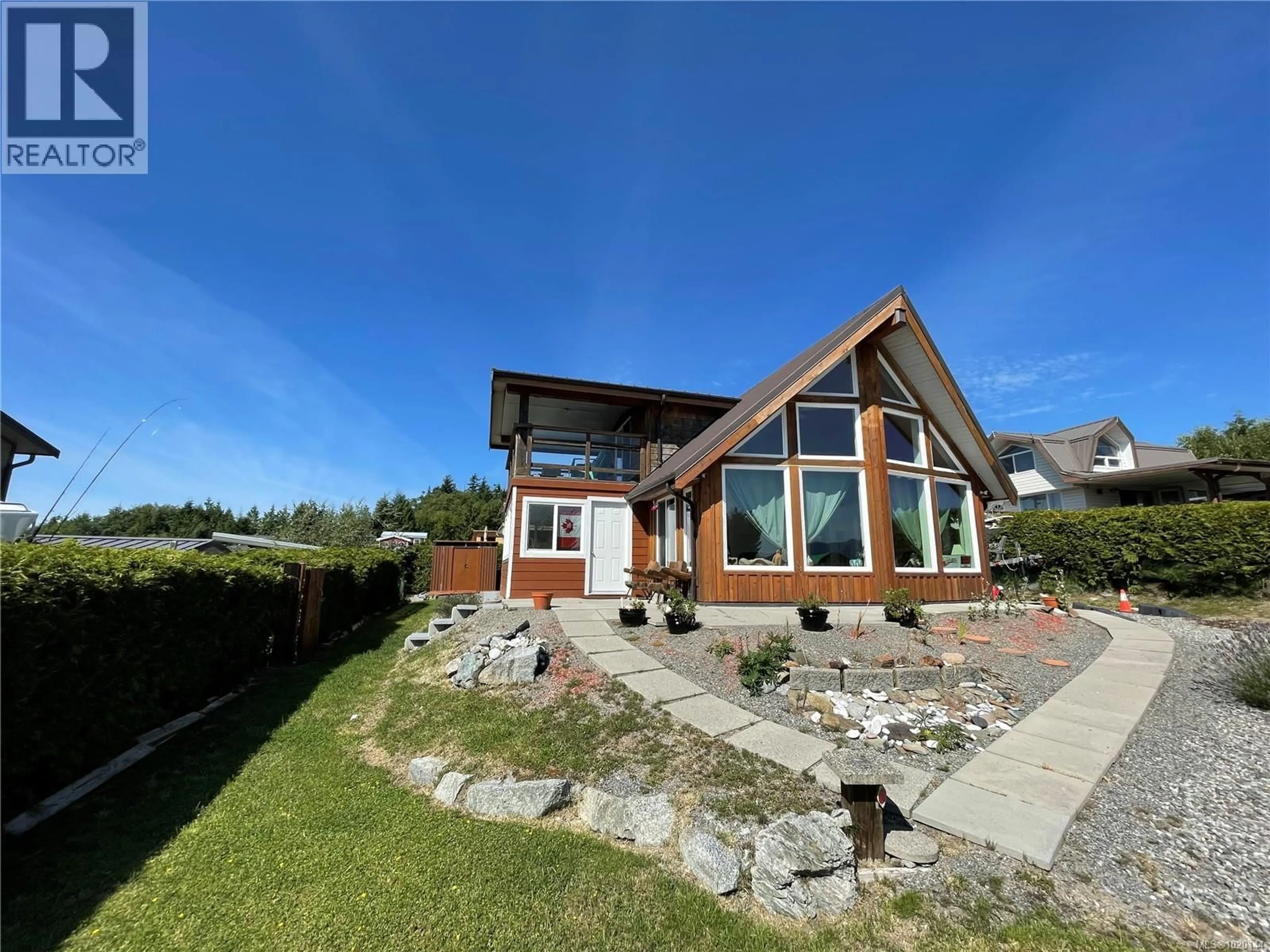 A pic from outside/outdoor area/front of a property/back of a property/a pic from drone, water/lake/river/ocean view for 1049 SIXTH AVENUE, Ucluelet British Columbia V0R3A0