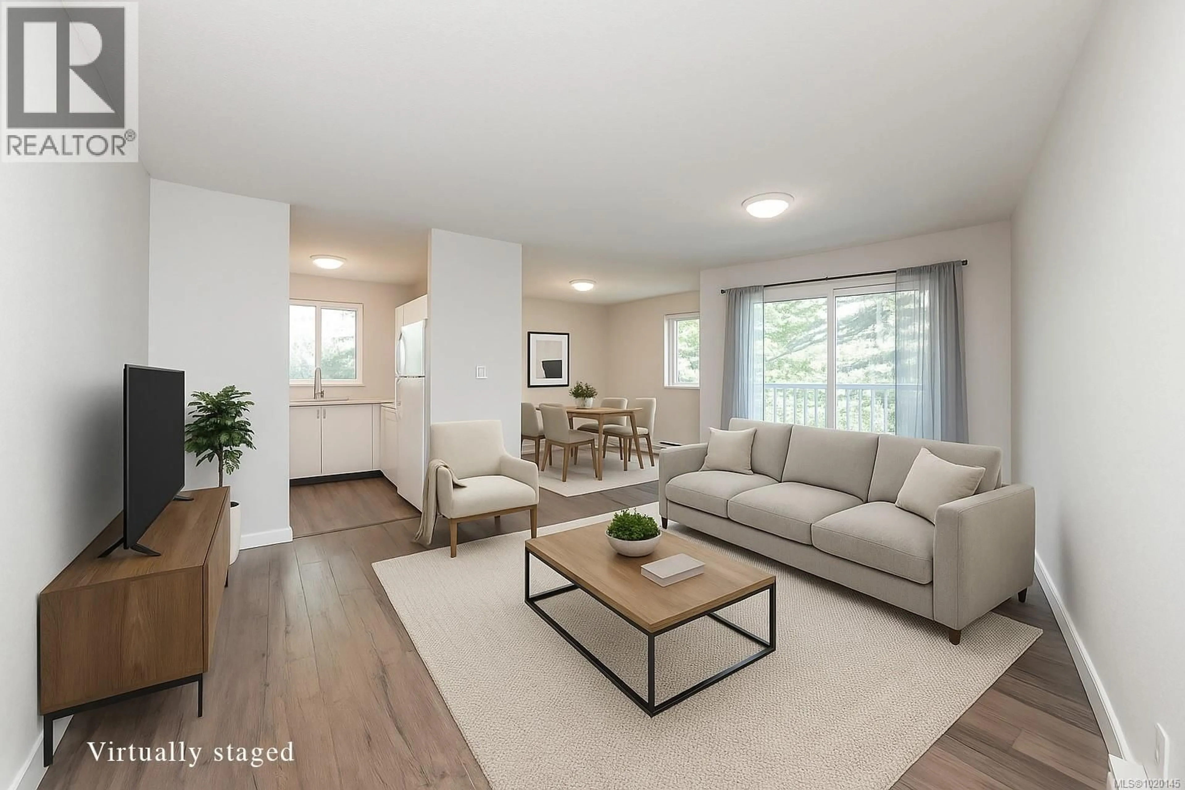 Living room with furniture, wood/laminate floor for 409 - 1050 BRAIDWOOD ROAD, Courtenay British Columbia V9N3R9