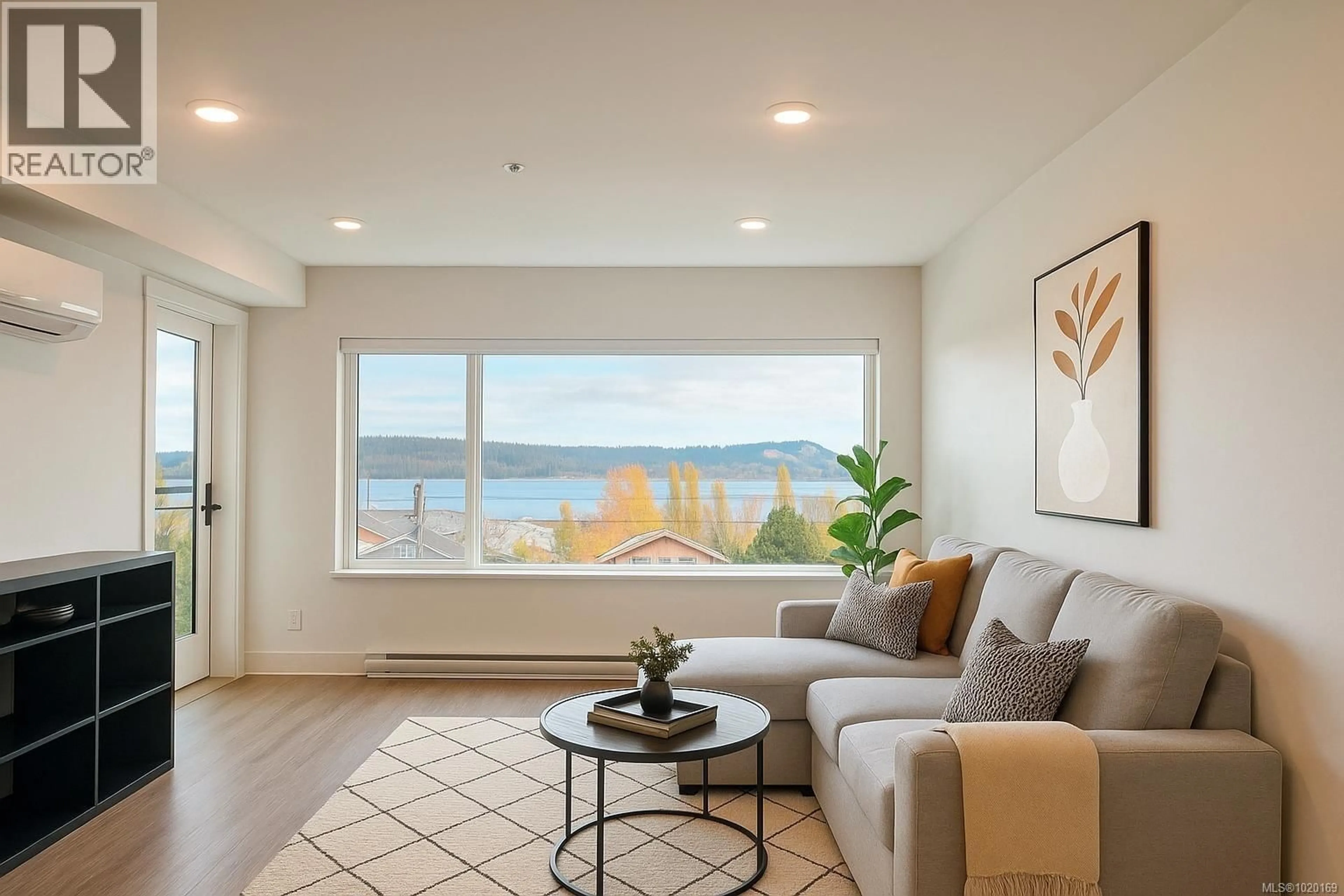 Living room with furniture, unknown for 306 - 147 HALIBURTON STREET, Nanaimo British Columbia V9R4V9