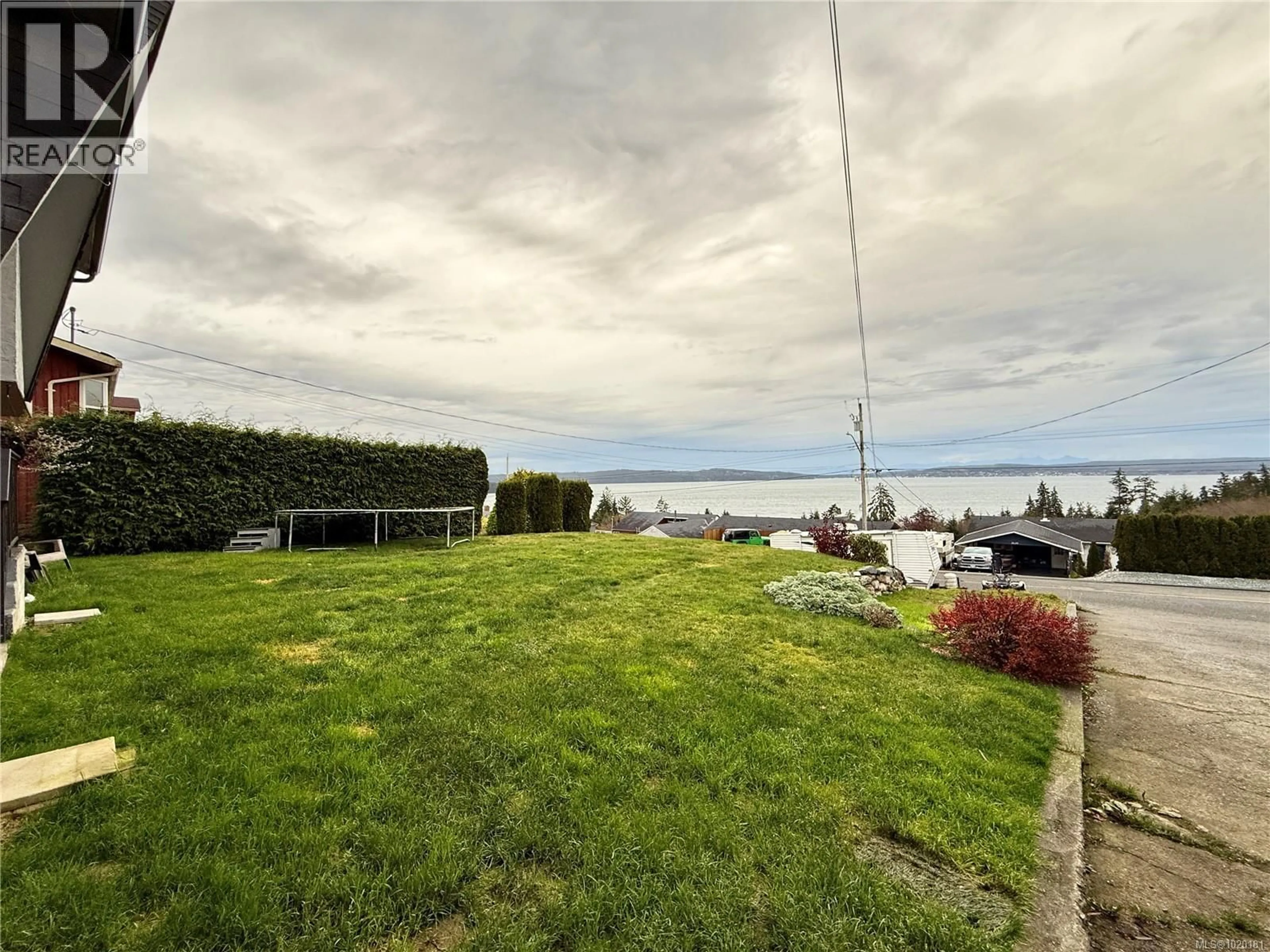 A pic from outside/outdoor area/front of a property/back of a property/a pic from drone, water/lake/river/ocean view for 2611 CARDENA CRESCENT, Port McNeill British Columbia V0N2R0